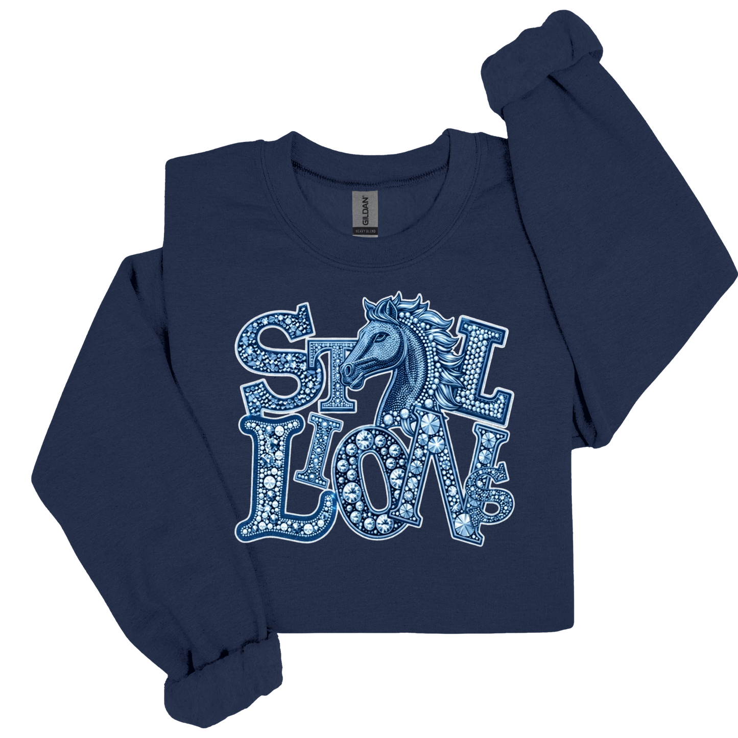 A navy blue long-sleeve crop top sweatshirt featuring a graphic on the front that reads 'STILL LION' in a decorative, rhinestone-like patterned font with a horse head illustration, shown on a plain white background.
