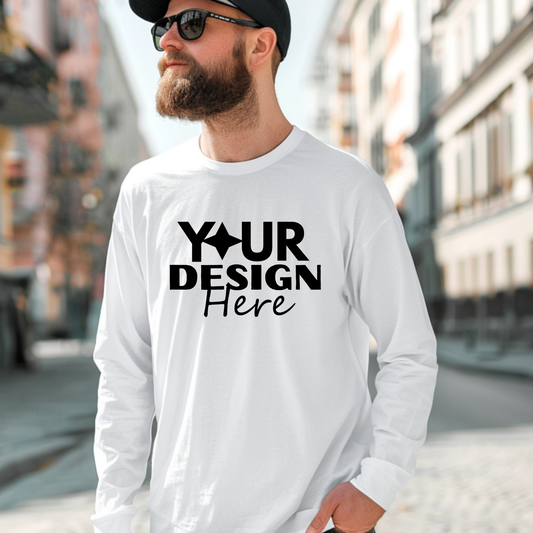 Man wearing a white long-sleeve shirt with 'Your Design Here' text in an urban setting Taylor-Made Custom Long Sleeve Shirt - Personalized Design Tee - Front Design Only