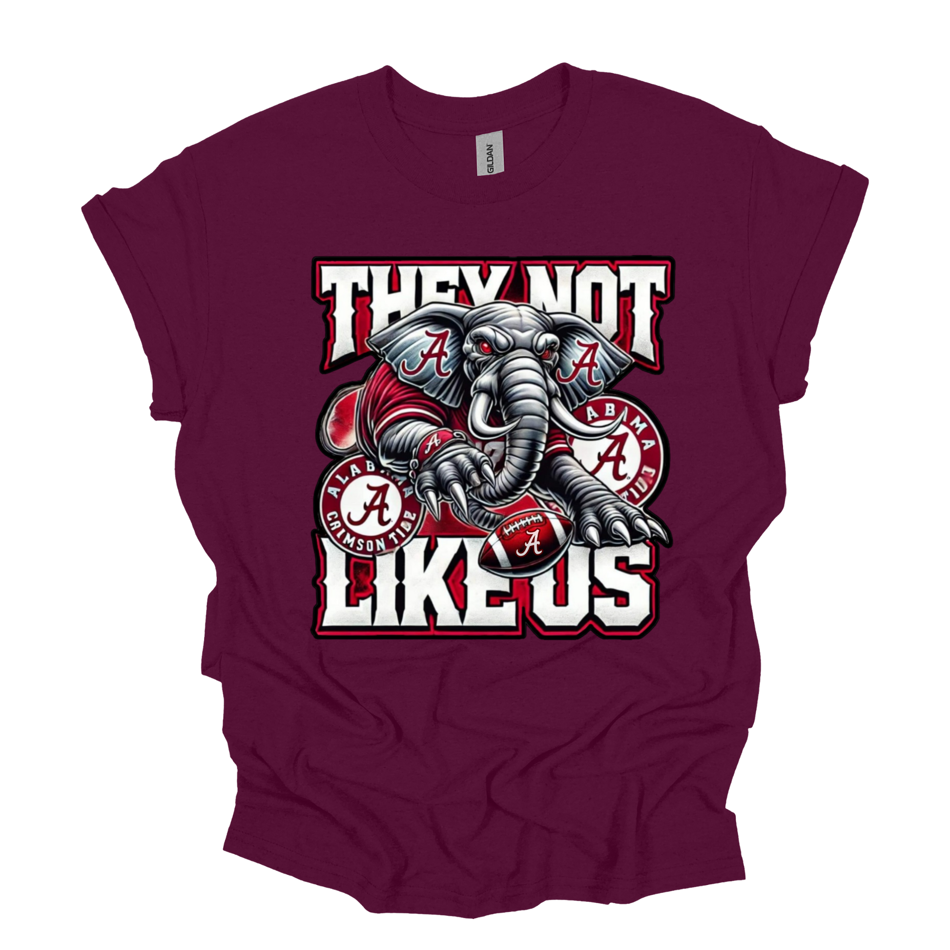 A maroon short-sleeve t-shirt with a graphic of an Alabama Crimson Tide elephant and the text 'THEY NOT LIKE US' in white and red.