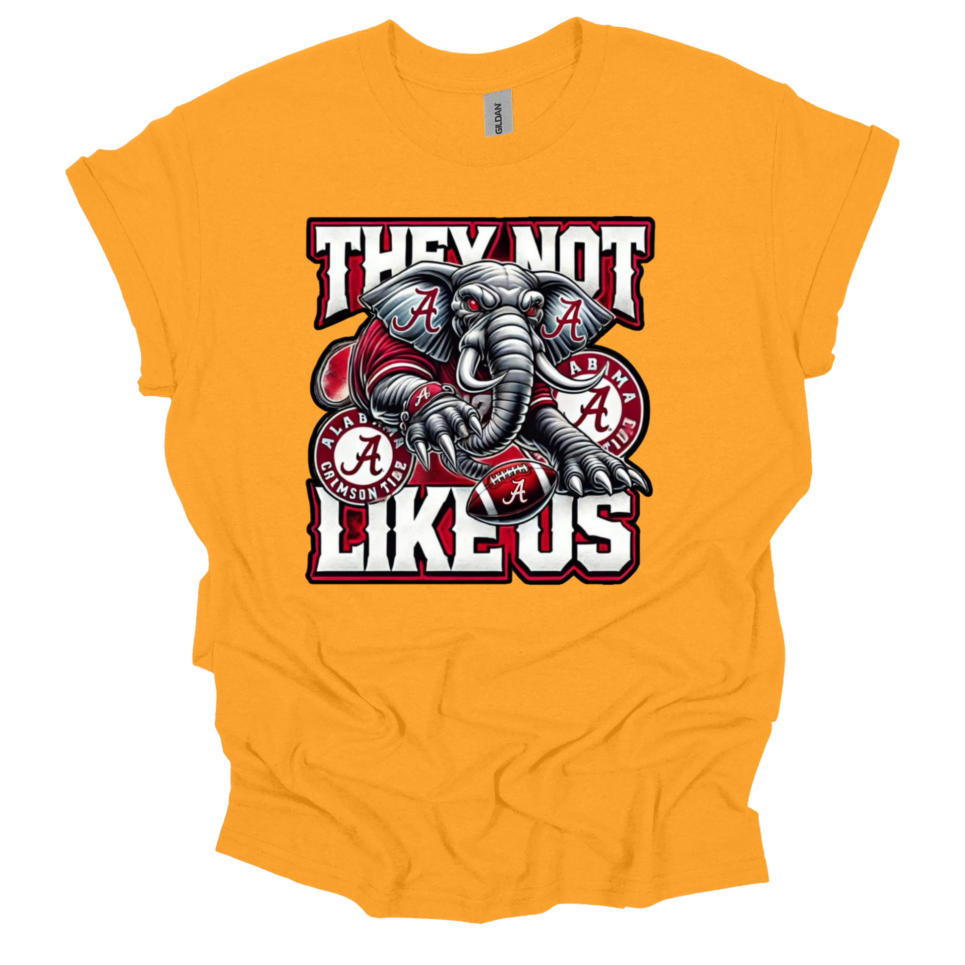 A bright orange short-sleeve t-shirt with a graphic of an Alabama Crimson Tide elephant mascot holding a football, flanked by the text 'THEY NOT LIKE US' in white and red block letters.
