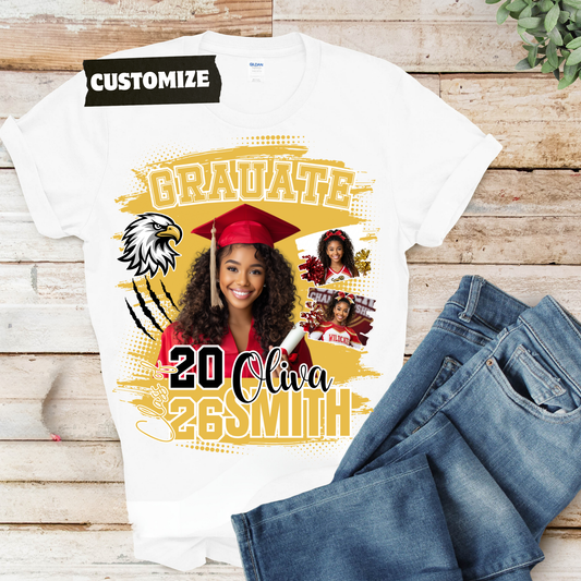 Graduation-themed t-shirt with customizable text on a wooden surface with jeans.  Customizable graduation photo t-shirt featuring senior portrait, school mascot, and sports organization logos in school colors