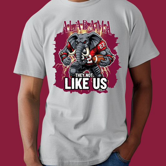 Gray t-shirt with an elephant graphic and text on a red background  Alabama Football T-Shirt "They Not Like Us" Alabama Game Day Shirt