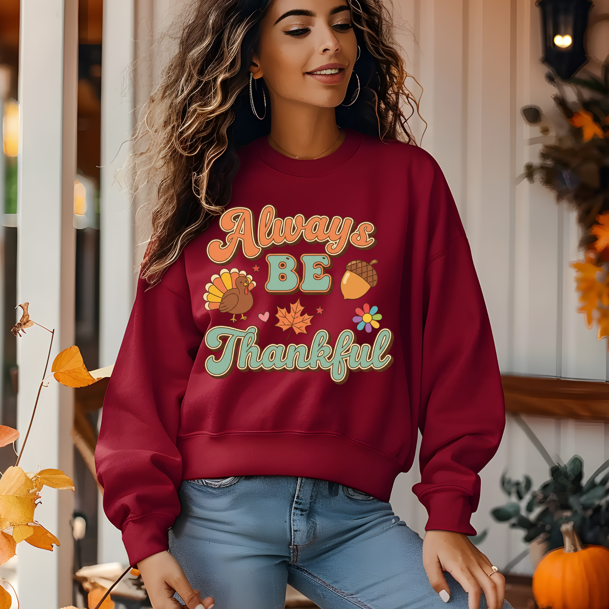Woman wearing a red sweatshirt with 'Always Be Thankful' text and fall-themed graphics. Retro Thanksgiving Sweatshirt "Always Be Thankful" Fall Harvest Crewneck Sweater