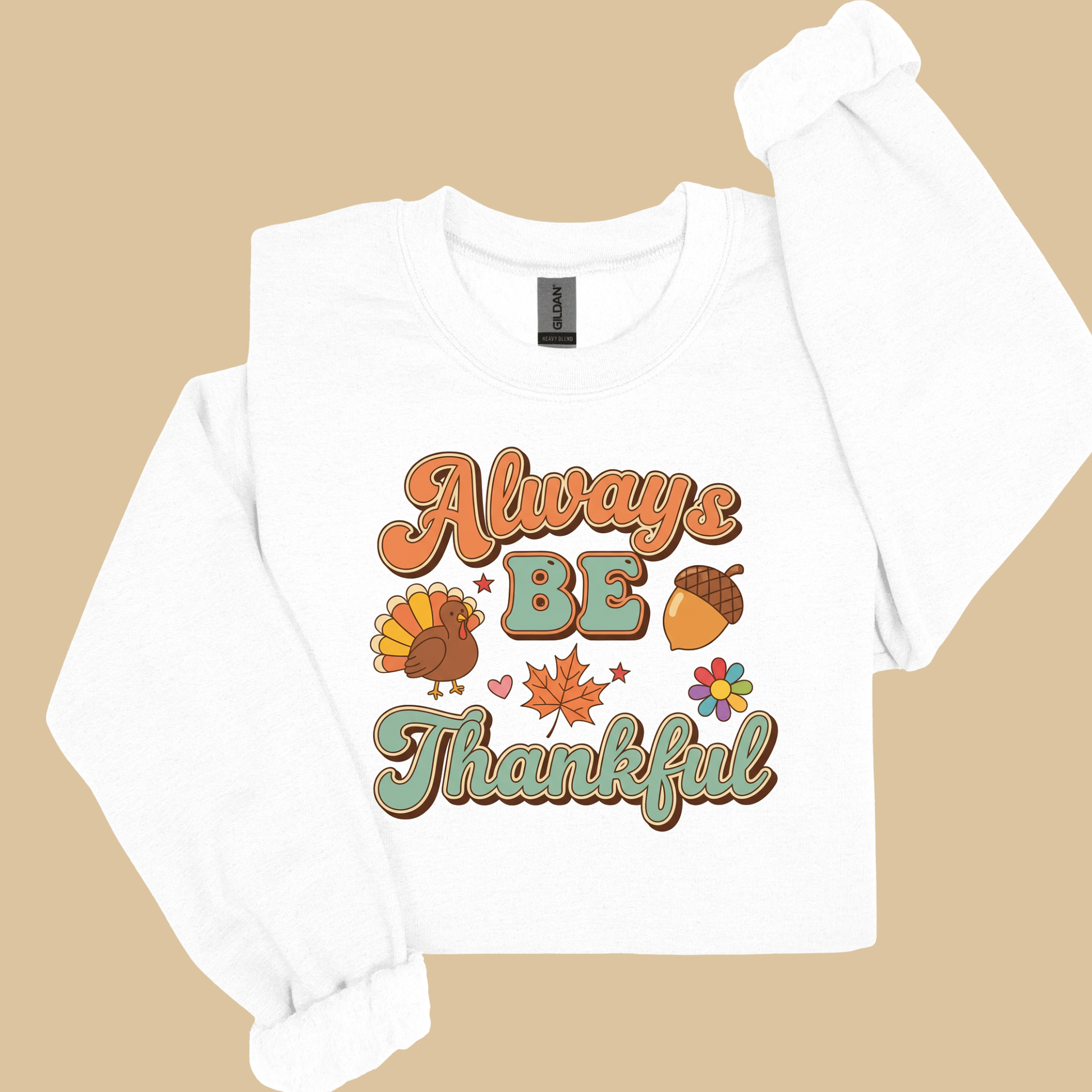 White long-sleeve shirt with 'Always Be Thankful' text and graphics on a beige background Retro Thanksgiving Sweatshirt "Always Be Thankful" Fall Harvest Crewneck Sweater