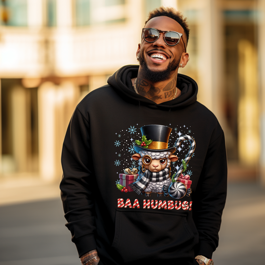 Man wearing a black hoodie with a festive design and 'Baa Humbug!' text, standing outdoors.