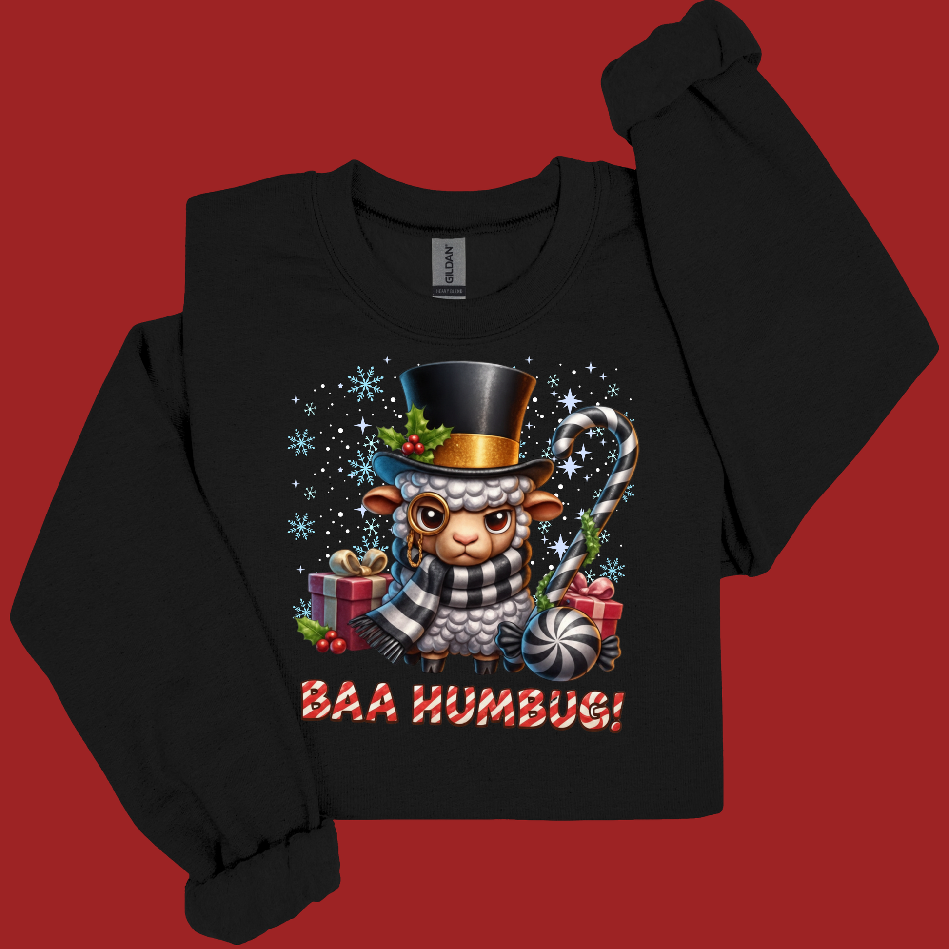 Black sweatshirt with a festive design of a sheep wearing a top hat and scarf, surrounded by Christmas elements on a red background.