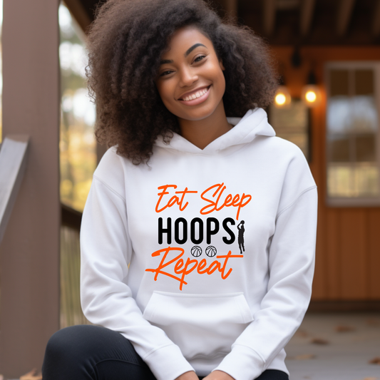 Basketball Hoodie: "Eat Sleep Hoops Repeat" Team Basketball Hoodie A perfect gift for basketball players who want to showcase their love for the game with a distinctive and stylish hoodie.