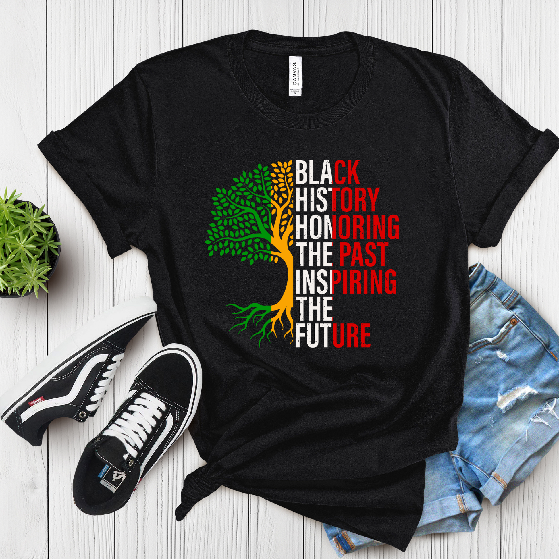 Unisex t-shirt featuring the phrase "Black History: Honoring The Past, Inspiring the Future," celebrating Black heritage and empowerment with bold, inspiring text to celebrate Black History and Cultural Pride with this shirt