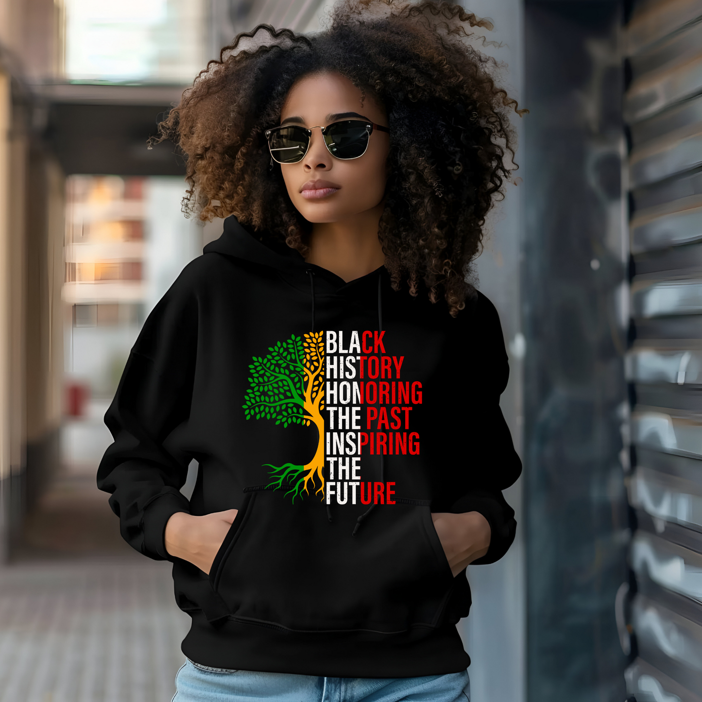 Black Women Wearing Unisex sweatshirt featuring the phrase "Black History: Honoring The Past, Inspiring the Future," celebrating Black heritage and empowerment with bold, inspiring text to celebrate Black History Month and Black Culture in a hoodie