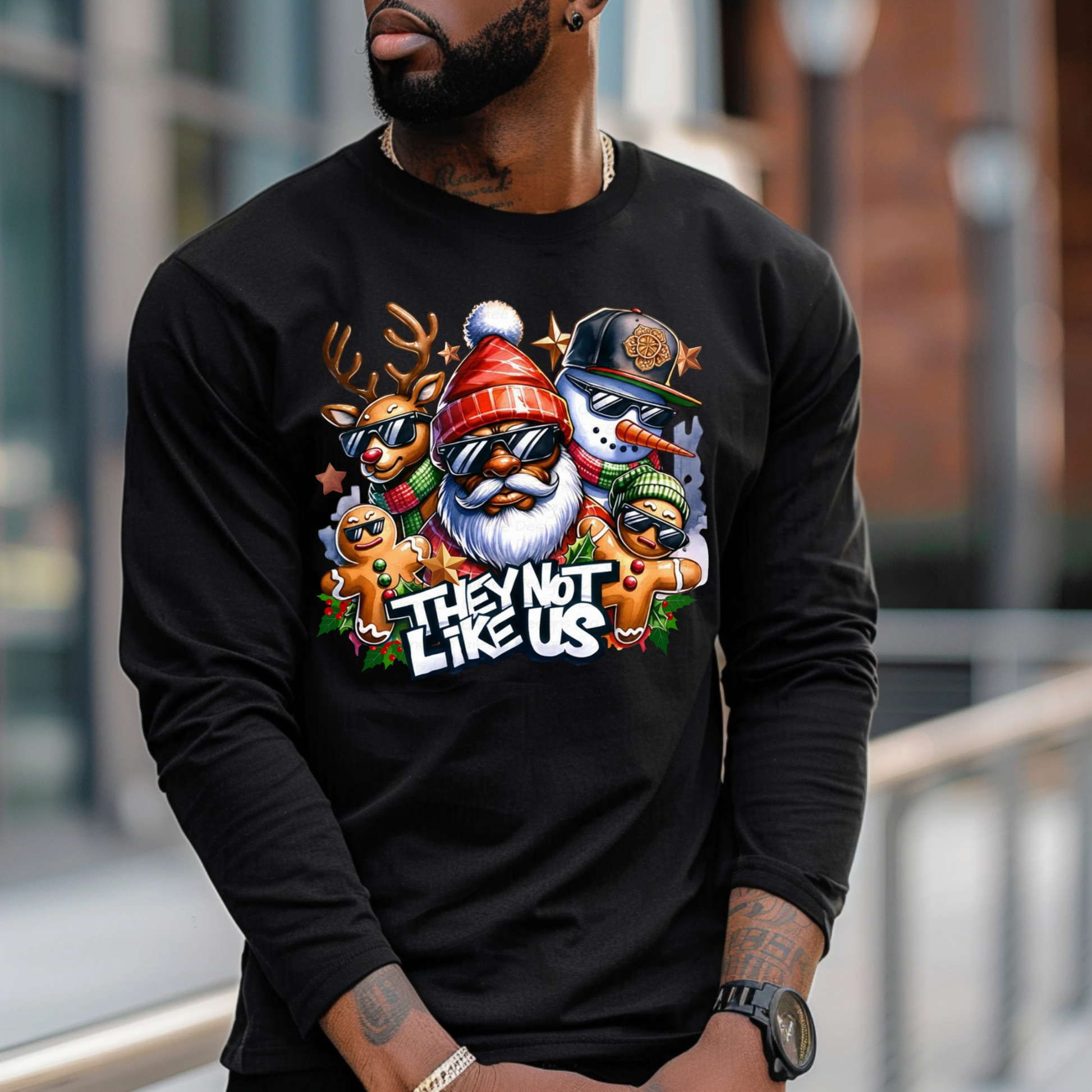 Person wearing a black long-sleeve shirt with colorful graphic design and text.