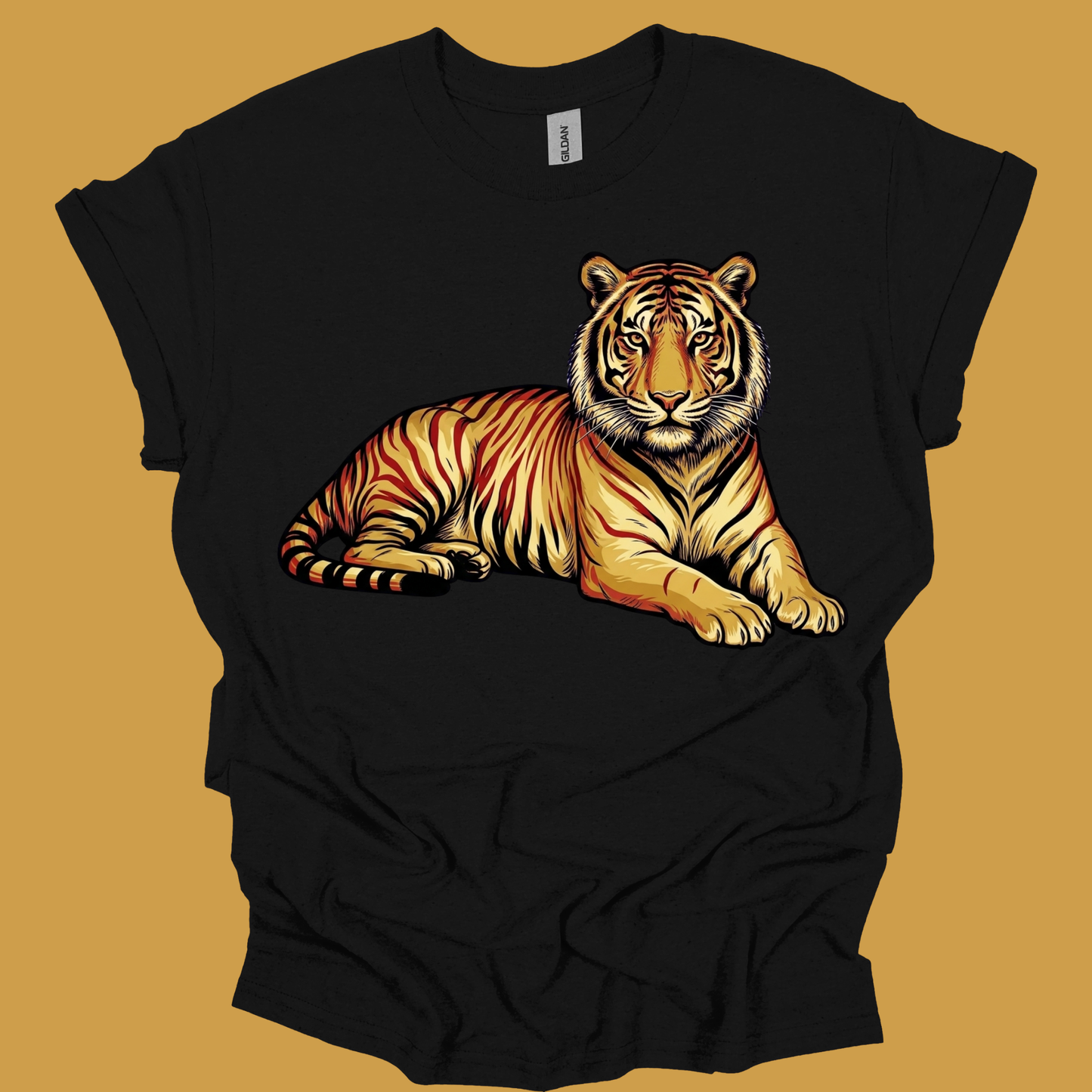 A black short-sleeve t-shirt with a detailed graphic of a resting tiger in orange, yellow, and black stripes, displayed against a solid mustard yellow background.