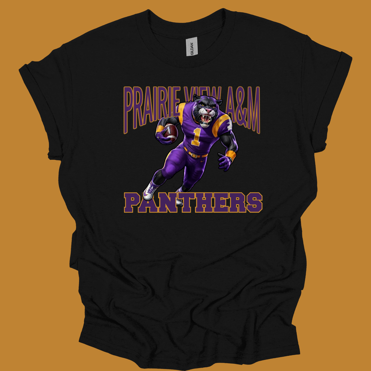 A black short-sleeve t-shirt with a graphic of a purple and gold football player and the text 'PRAIRIE VIEW A&M PANTHERS' on a solid orange-brown background.