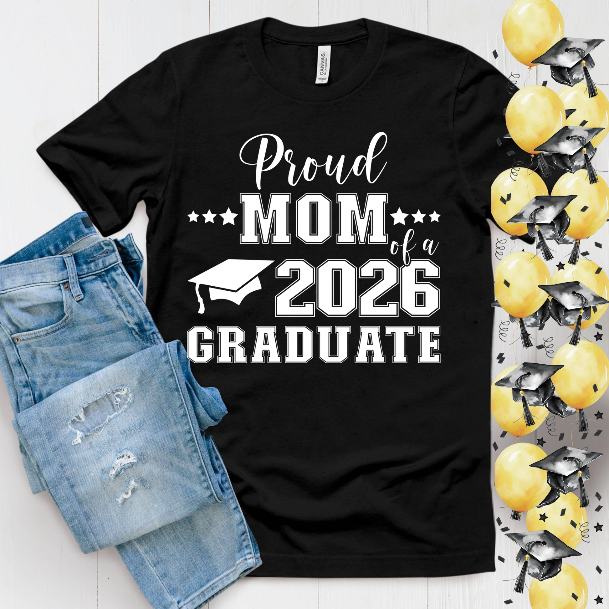 Black t-shirt with 'Proud Mom of a 2026 Graduate' text, paired with denim shorts on a white background.