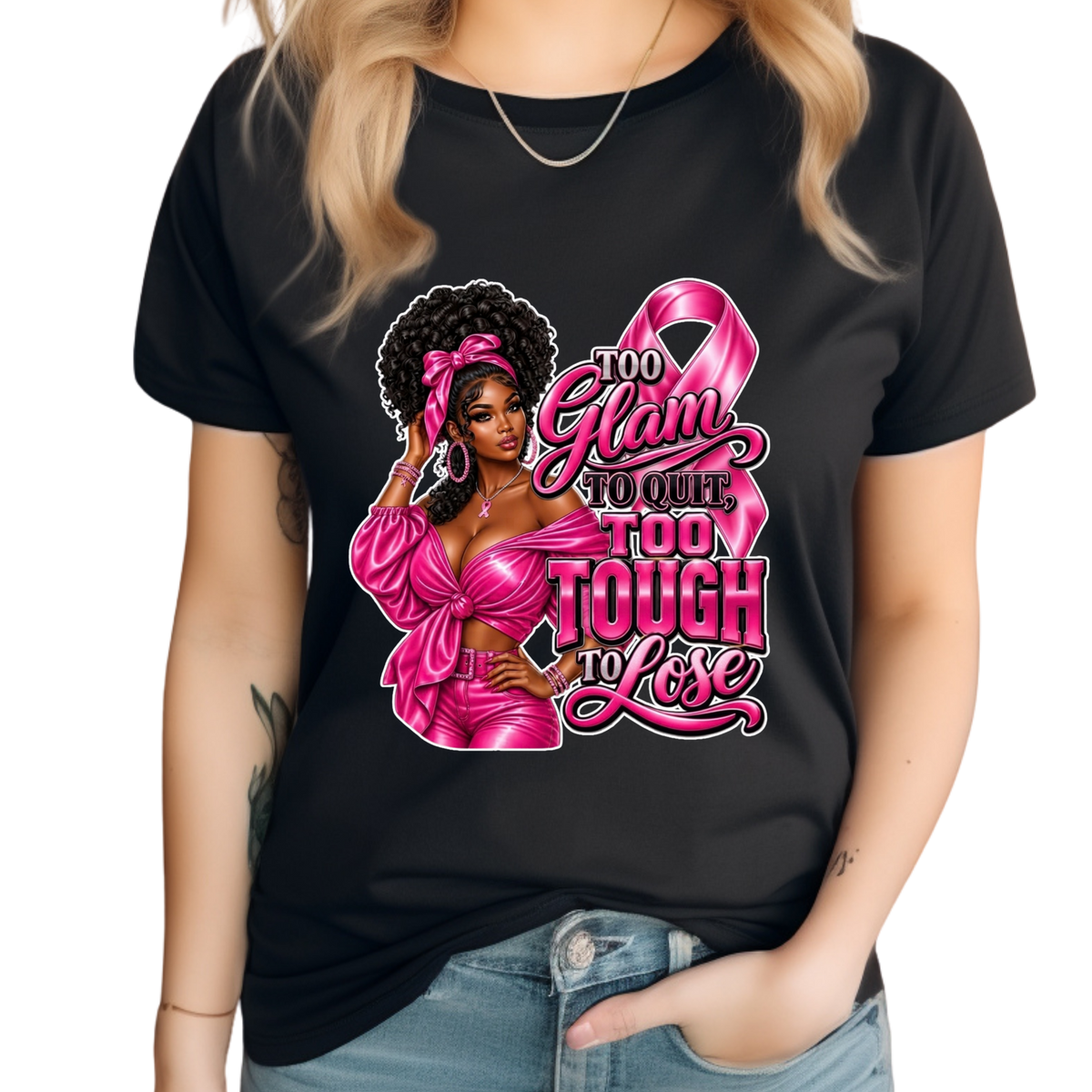 A woman wearing a black short-sleeve t-shirt with a pink graphic that reads 'Breast Cancer WARRIOR' with a pink ribbon and boxing gloves, paired with blue jeans against a white background.