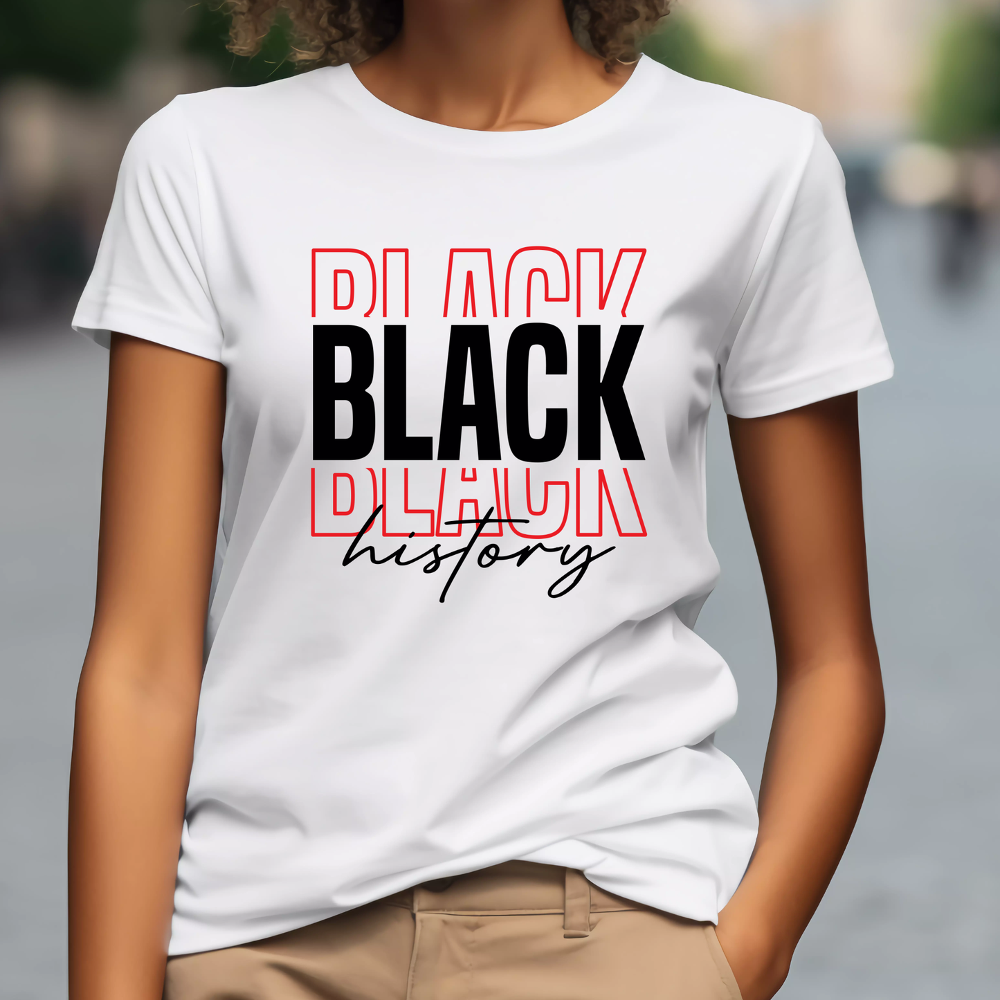 Person wearing a white t-shirt with 'Black History' text in red and black.