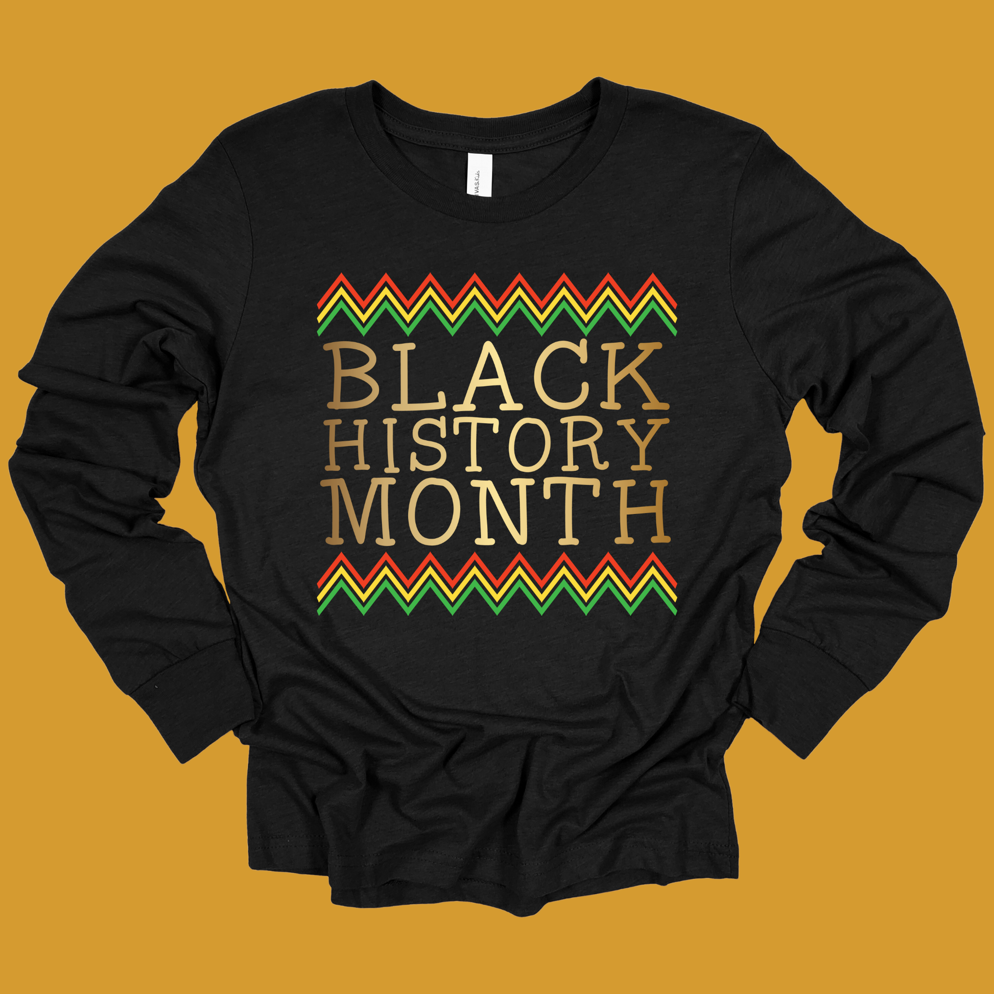 Black long-sleeve shirt with 'Black History Month' text and chevron design on a yellow background