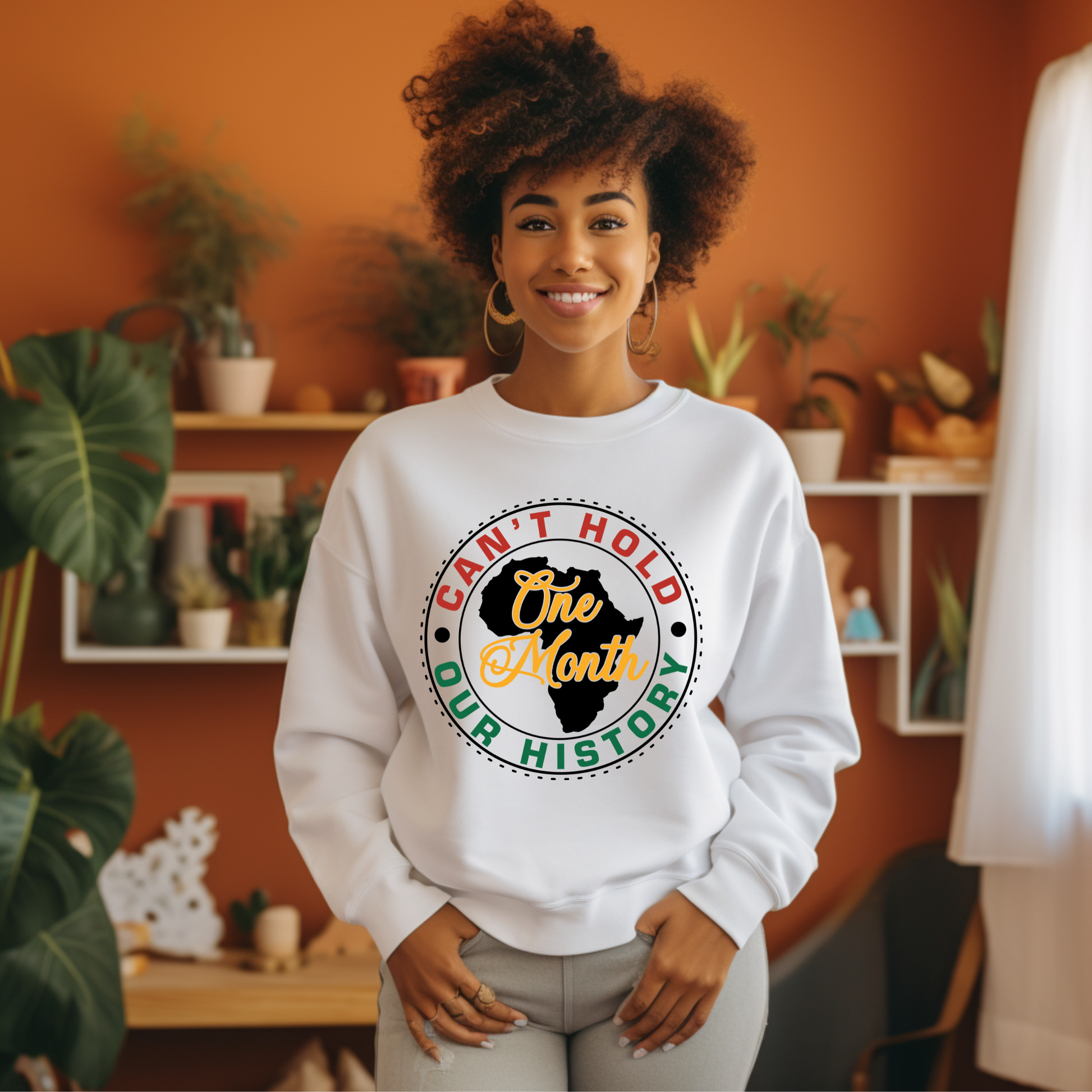 Black Women wearing white warm crewneck sweatshirt sweater with the phrase One Month Can't Hold our history in support of Black Culture and Black History Month Celebrations 