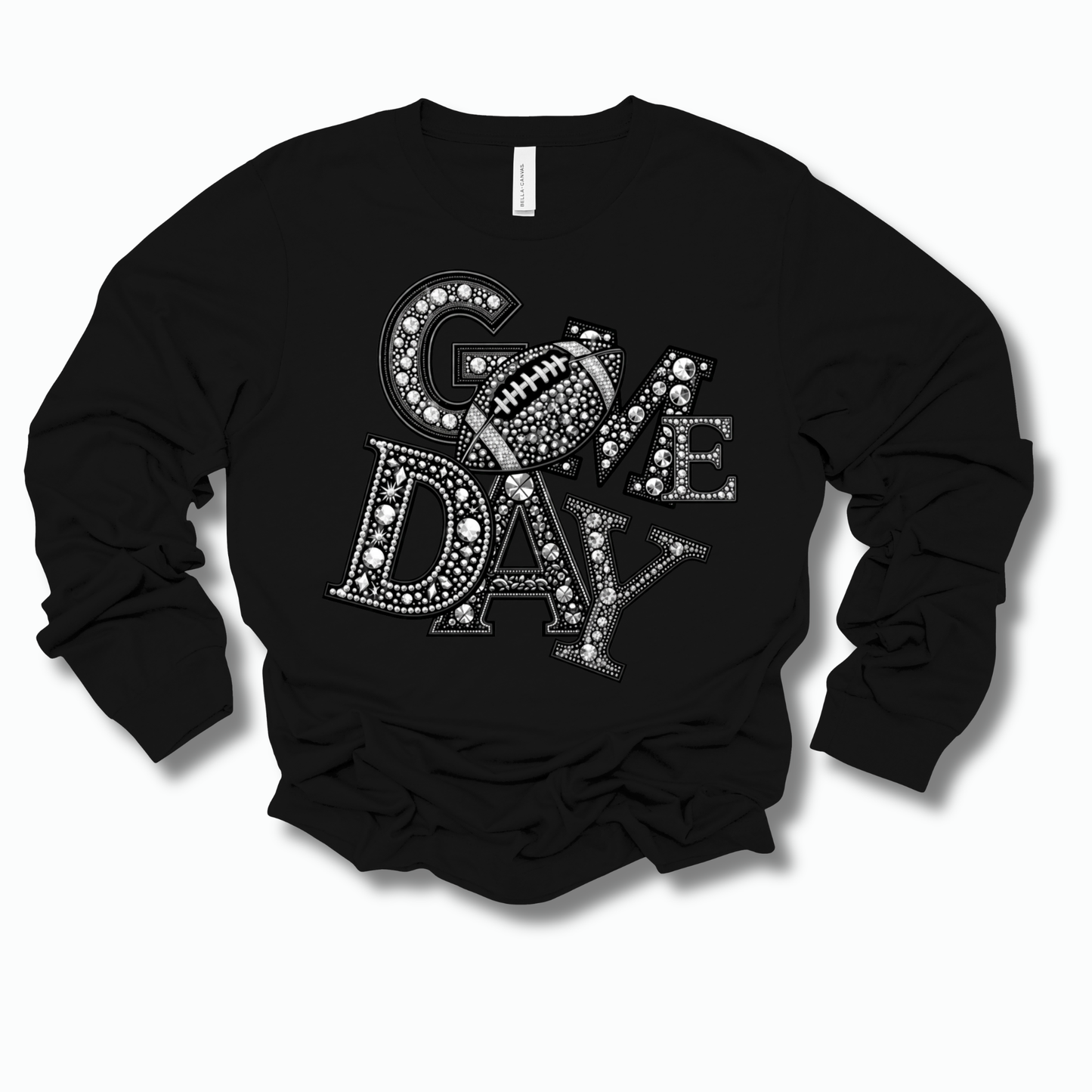 A black long-sleeve crewneck sweatshirt featuring a large 'COME DAY' graphic across the chest, where each letter is filled with a pattern of white dots, stars, and football motifs, set against a plain white background.
