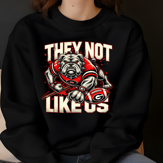 Black sweatshirt with bulldog graphic and text 'THEY NOT LIKE US' on a dark background