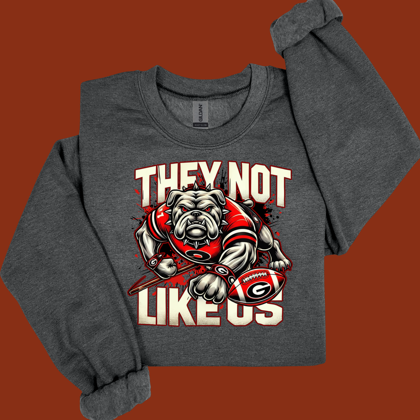Gray sweatshirt with bulldog graphic and text on a brown background