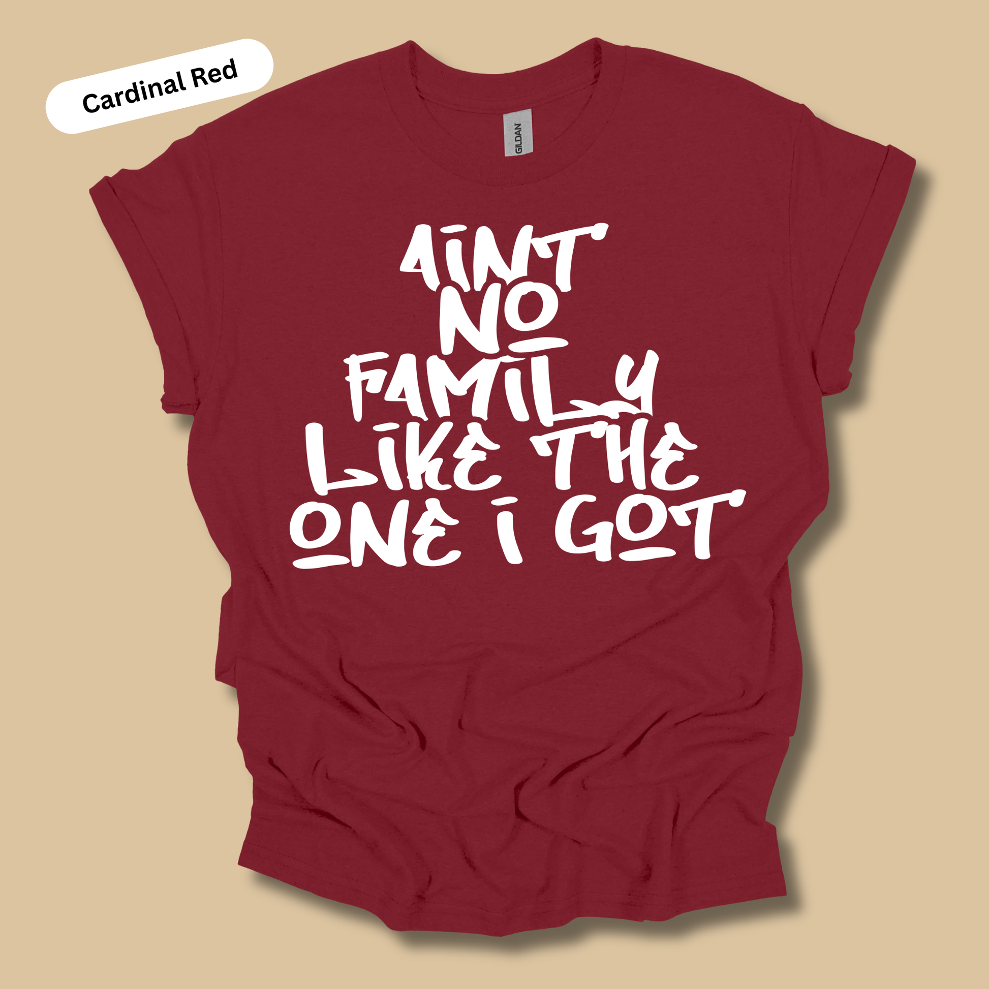Cardinal red t-shirt with white text on a beige background