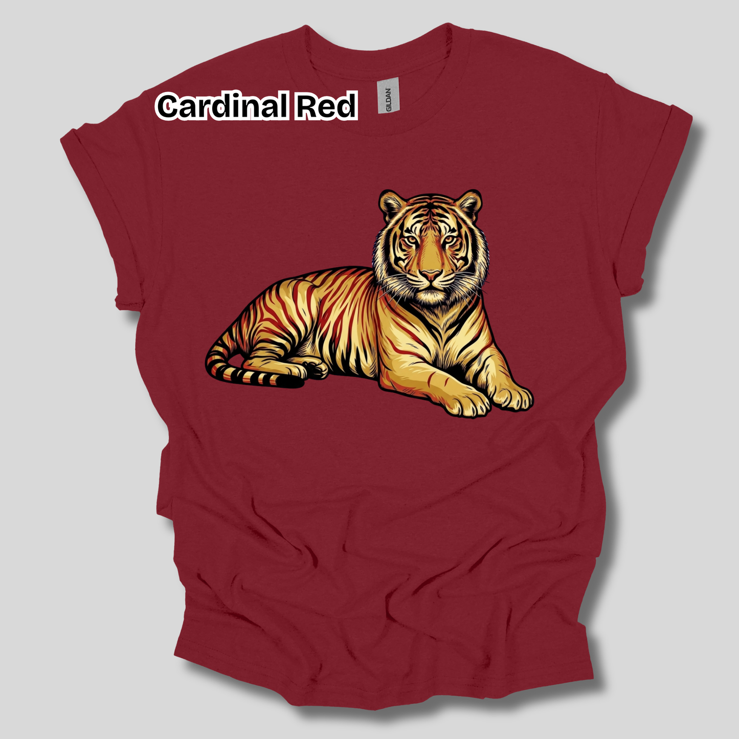 A maroon short-sleeve t-shirt with a graphic of a lying tiger on the front. The text 'Cardinal Red' is printed in white with a black outline near the upper left chest.