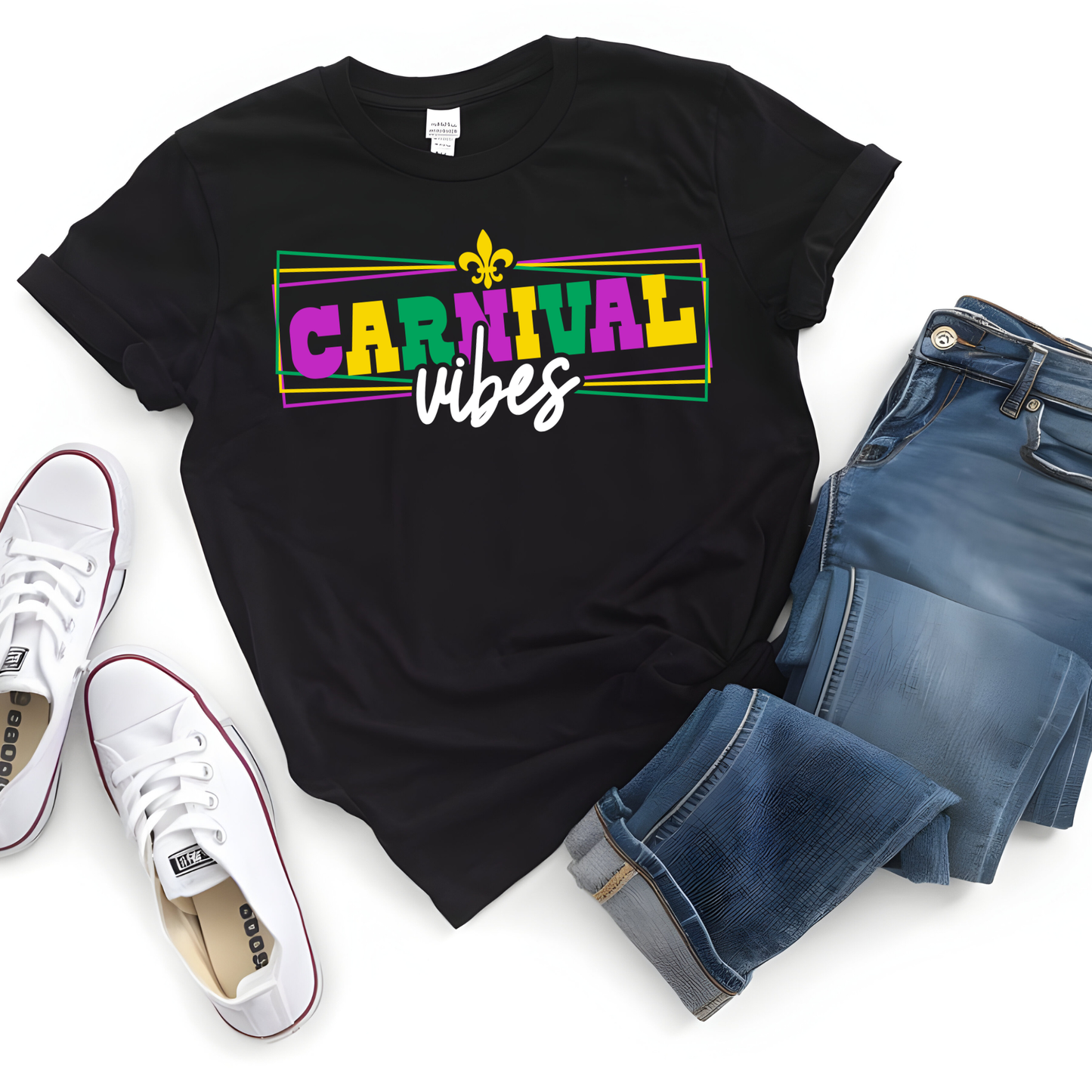 Black t-shirt with 'Carnival vibes' text, white sneakers, and blue jeans on a white background