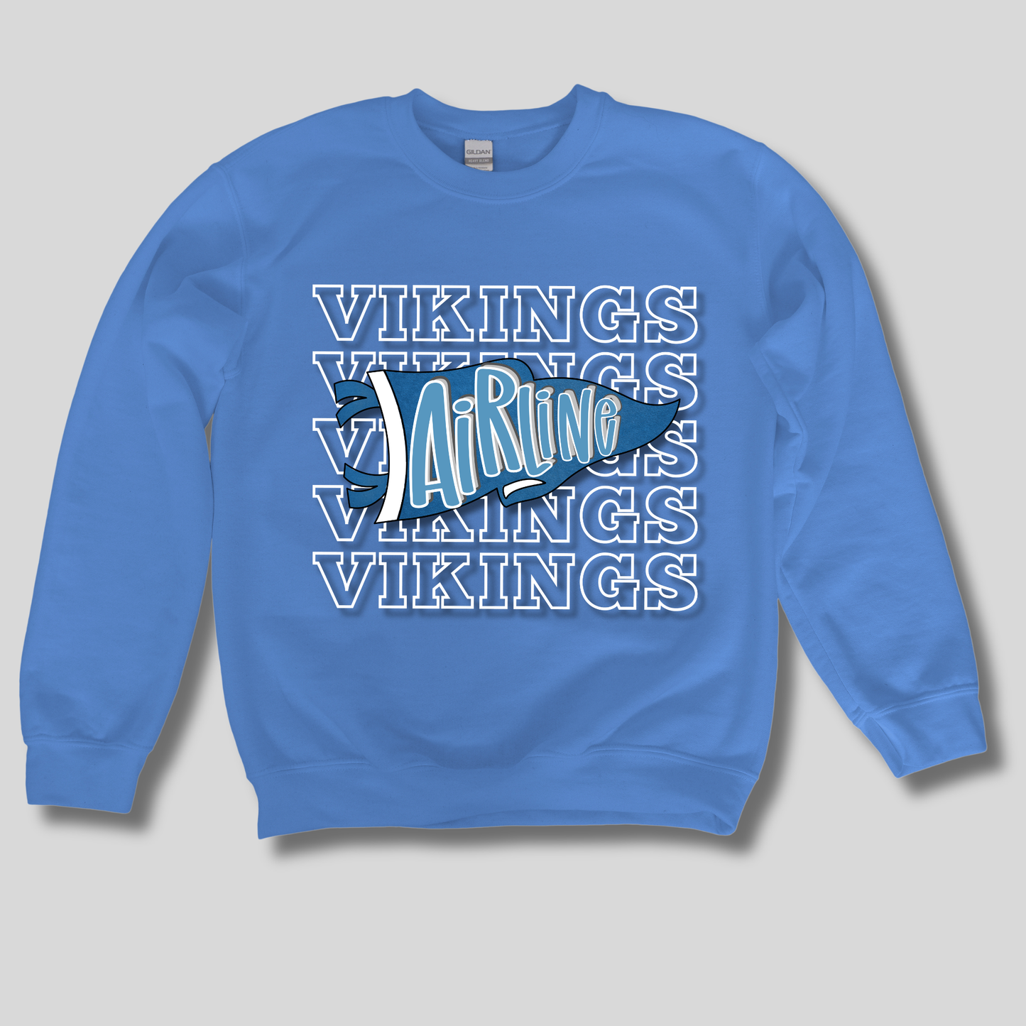 A blue crewneck sweatshirt featuring a graphic design on the front with the word 'VIKINGS' repeated in white outline text, overlaid with a stylized blue and white 'AirLine' pennant logo.