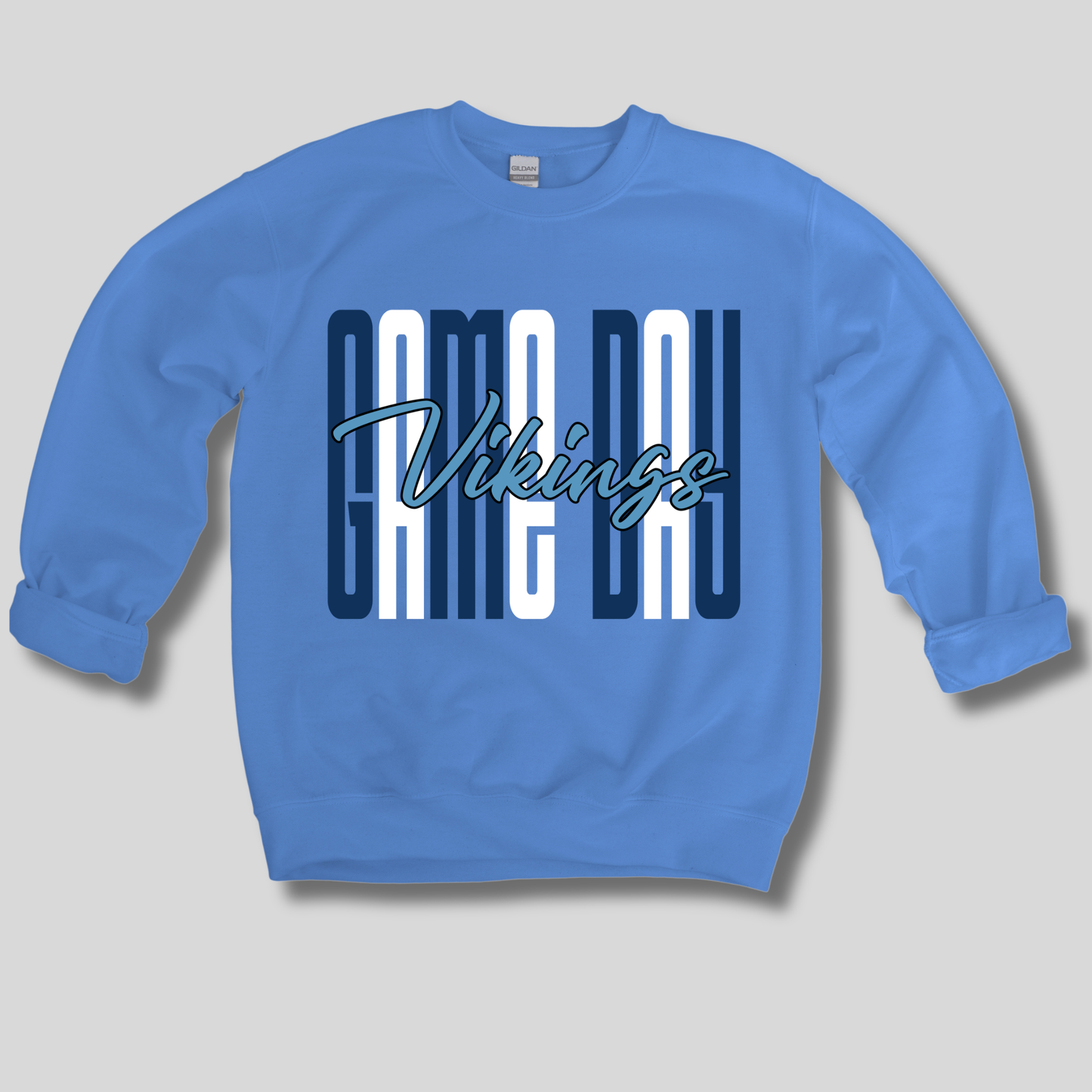 A light blue crewneck sweatshirt featuring a 'Vikings Airline' graphic on the chest, displayed against a neutral gray background.