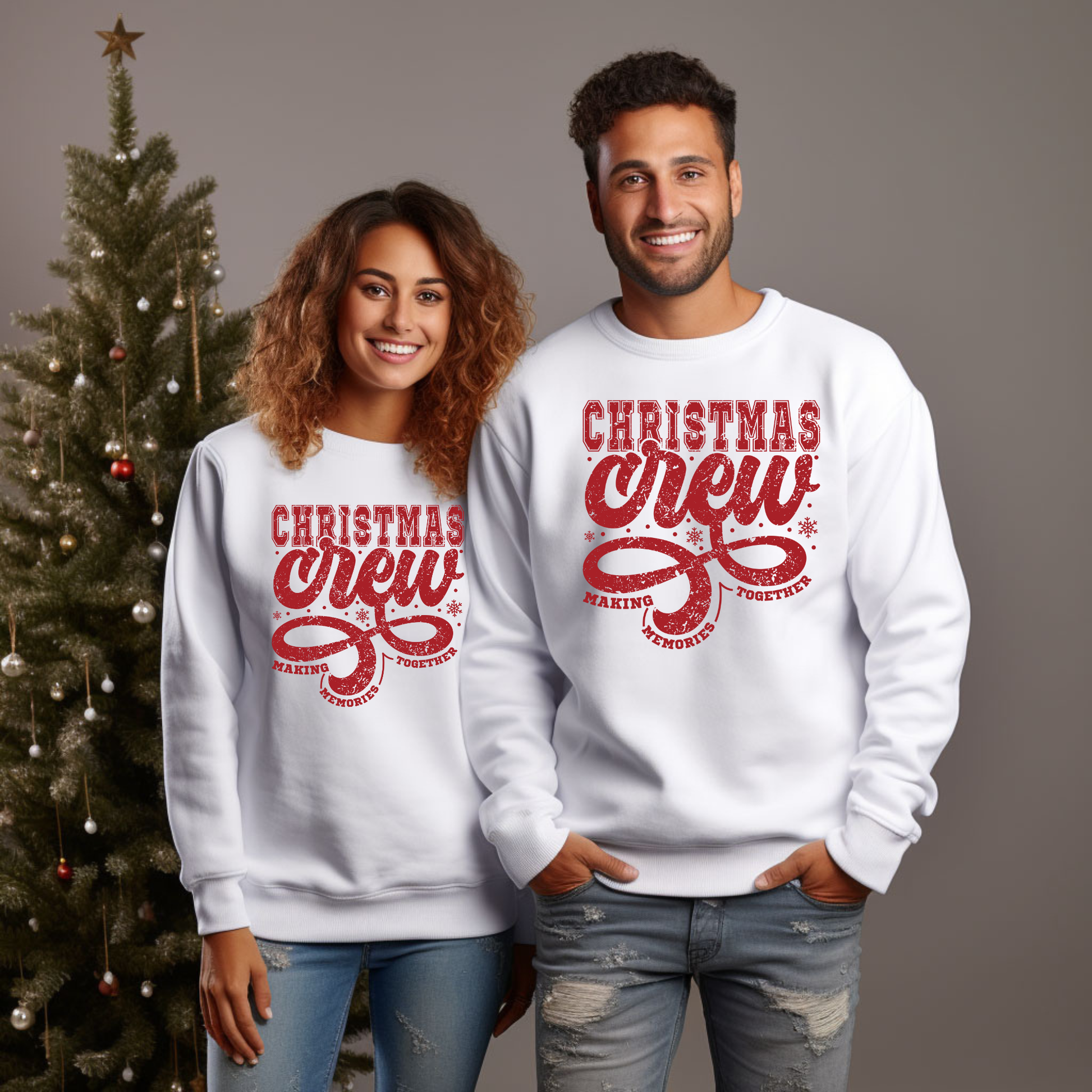 Two people wearing 'Christmas Crew' sweatshirts in front of a decorated Christmas tree.  Christmas Crew Making Memories Together T-Shirt - Family Matching Holiday Sweater