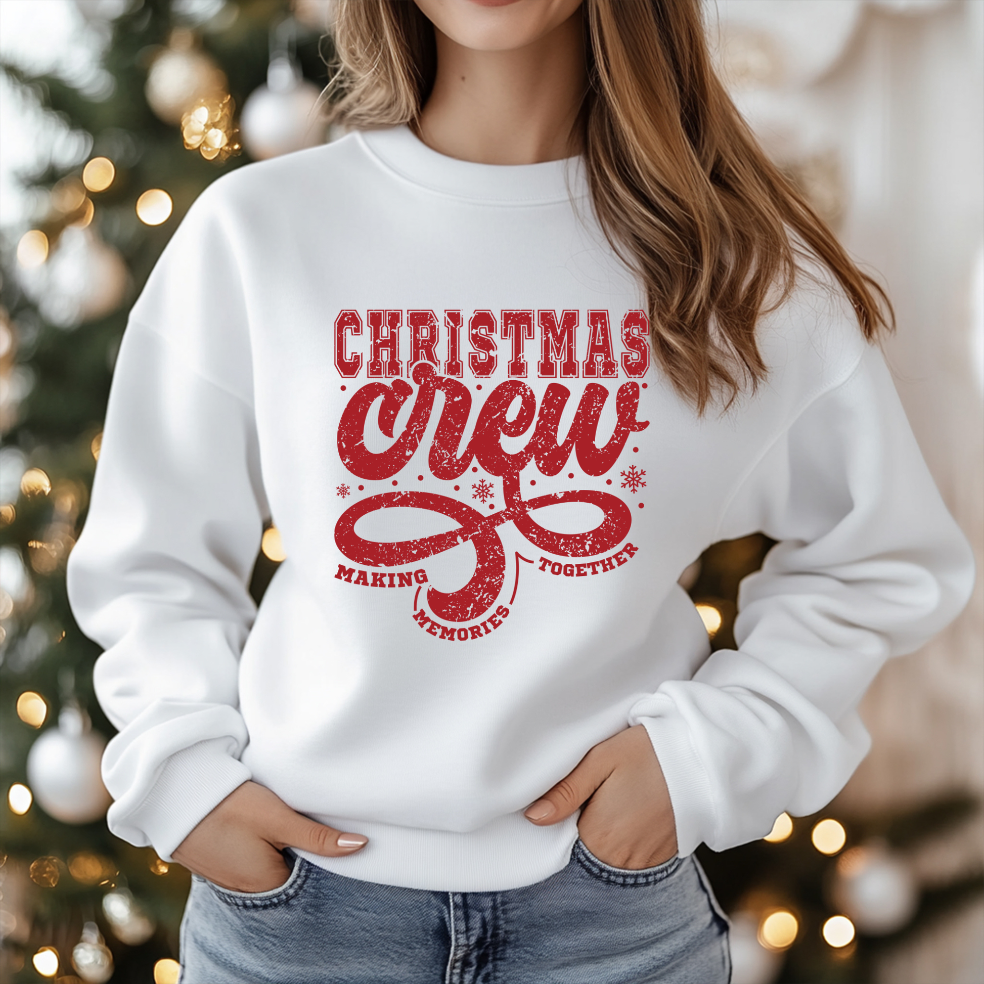 Person wearing a white sweatshirt with red 'Christmas Crew' text in front of a decorated Christmas tree.  Christmas Crew Making Memories Together T-Shirt - Family Matching Holiday Sweater