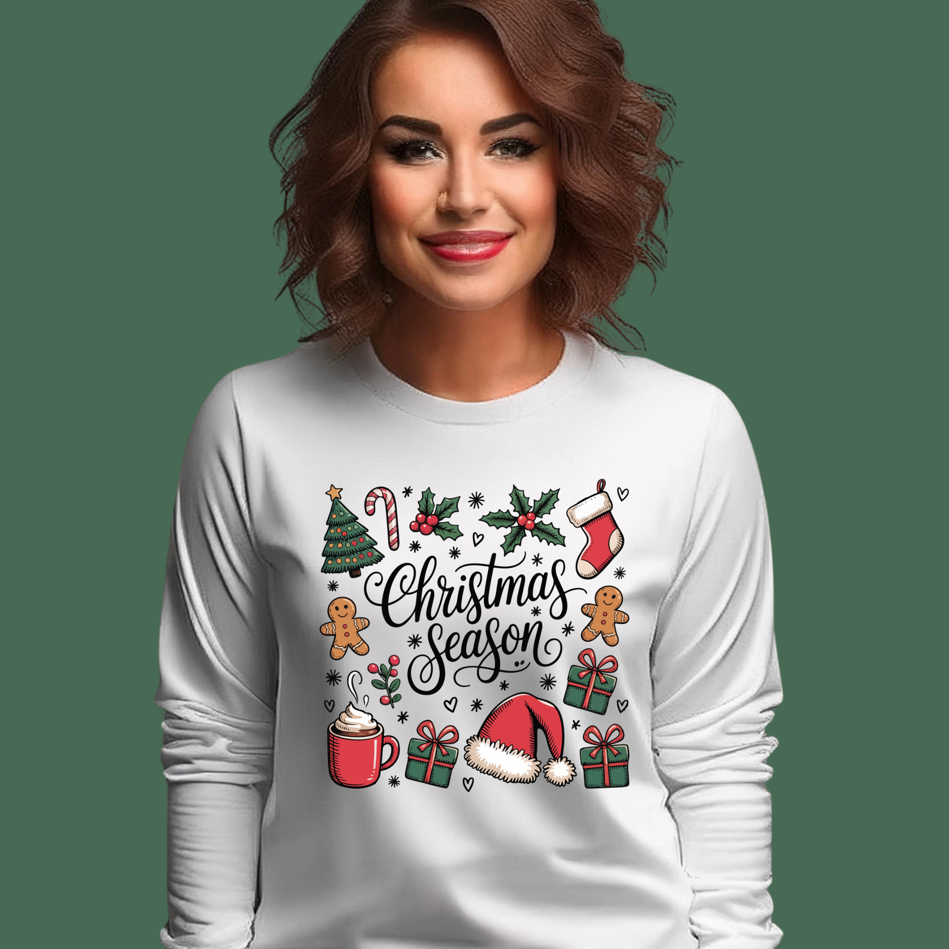 Woman wearing a white long-sleeve shirt with Christmas-themed graphics and text.
