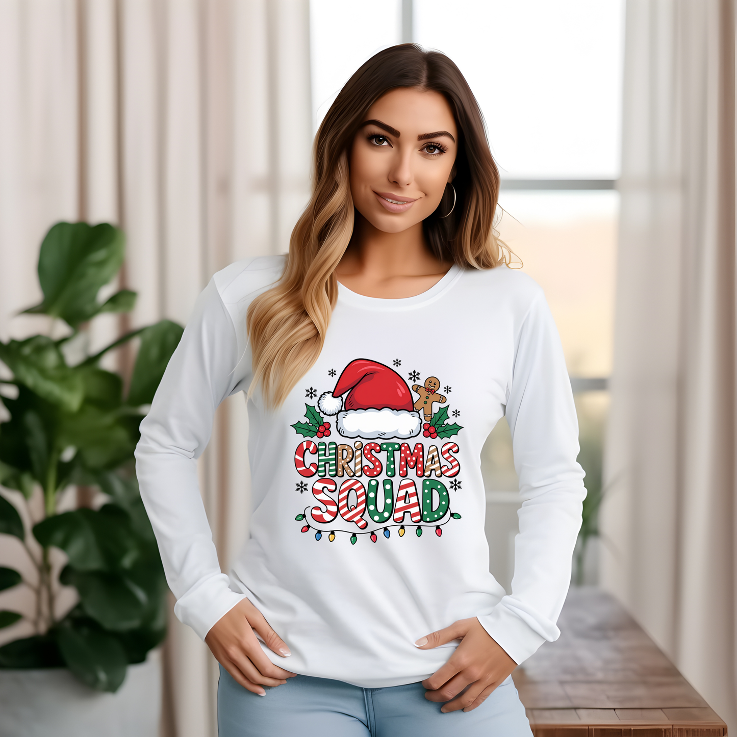 Woman wearing a white long-sleeve shirt with 'Christmas Squad' design in a home setting.  Matching Family Christmas Squad Shirt - Christmas Squad Family Matching T-Shirt