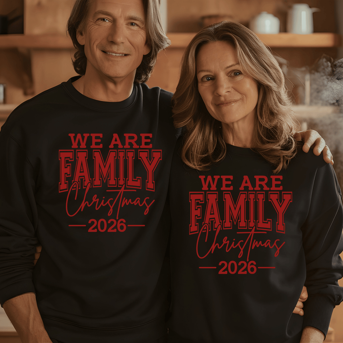 Set of five black matching family t-shirts printed with white 'We Are Family Christmas 2026' collegiate typography on a wooden backdrop.