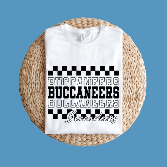 White t-shirt with 'Buccaneers' text design on a woven mat against a blue background Custom Mascot Shirt - Buccaneers Layered Game Day Cool School Spirit Tee