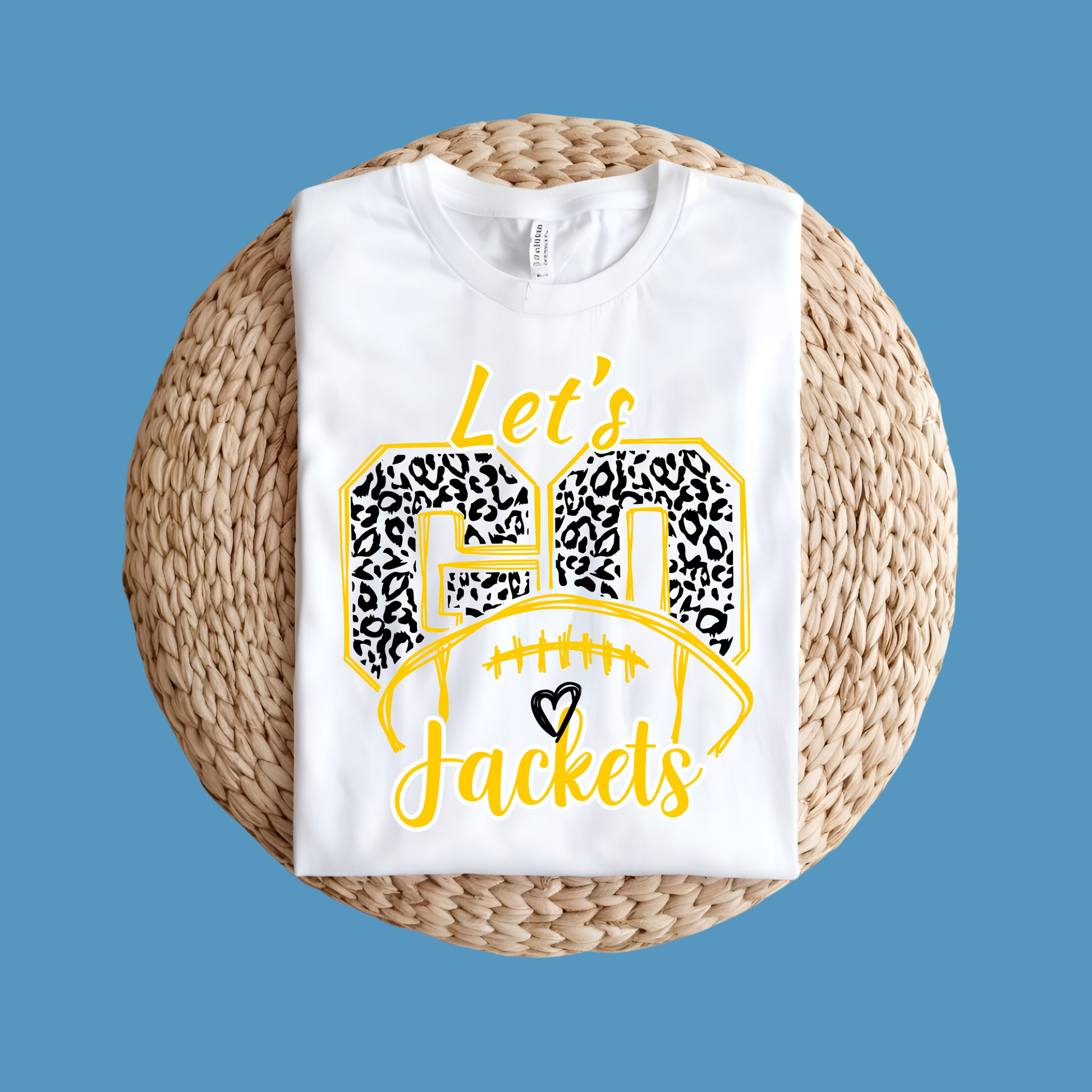 White t-shirt with 'Let's Go Jackets' design on a woven mat against a blue background Custom Mascot Shirt - Lets Go Jackets Game Day Cool Spirit Tee