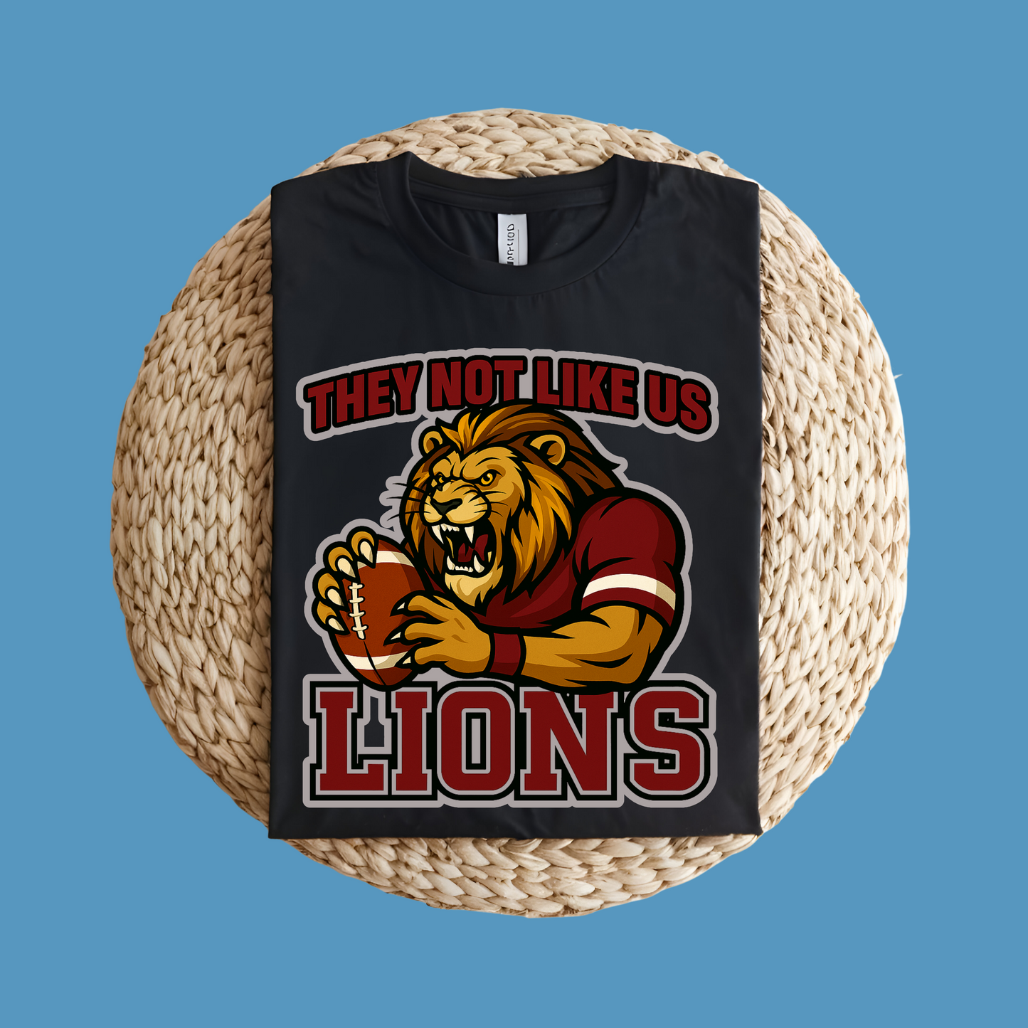 Black t-shirt with a lion graphic and text on a woven surface Custom Mascot Shirt - Lions They Not Like Us Version 2 School Spirit Tee