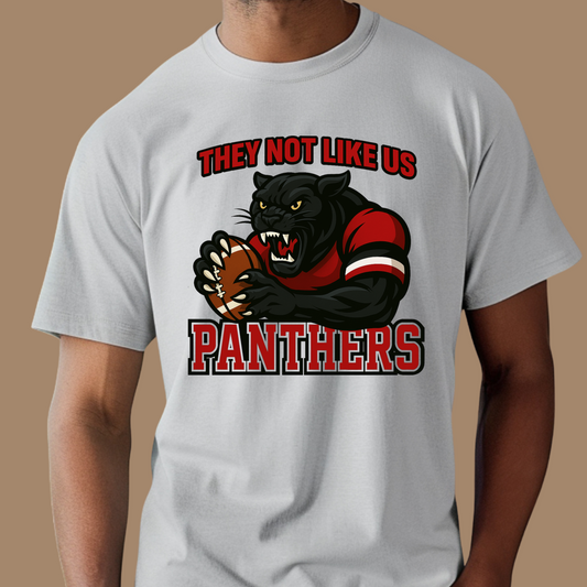 T-shirt with panther graphic and text on a brown background Custom Mascot Shirt - Panthers They Not Like Us Game Day Wear