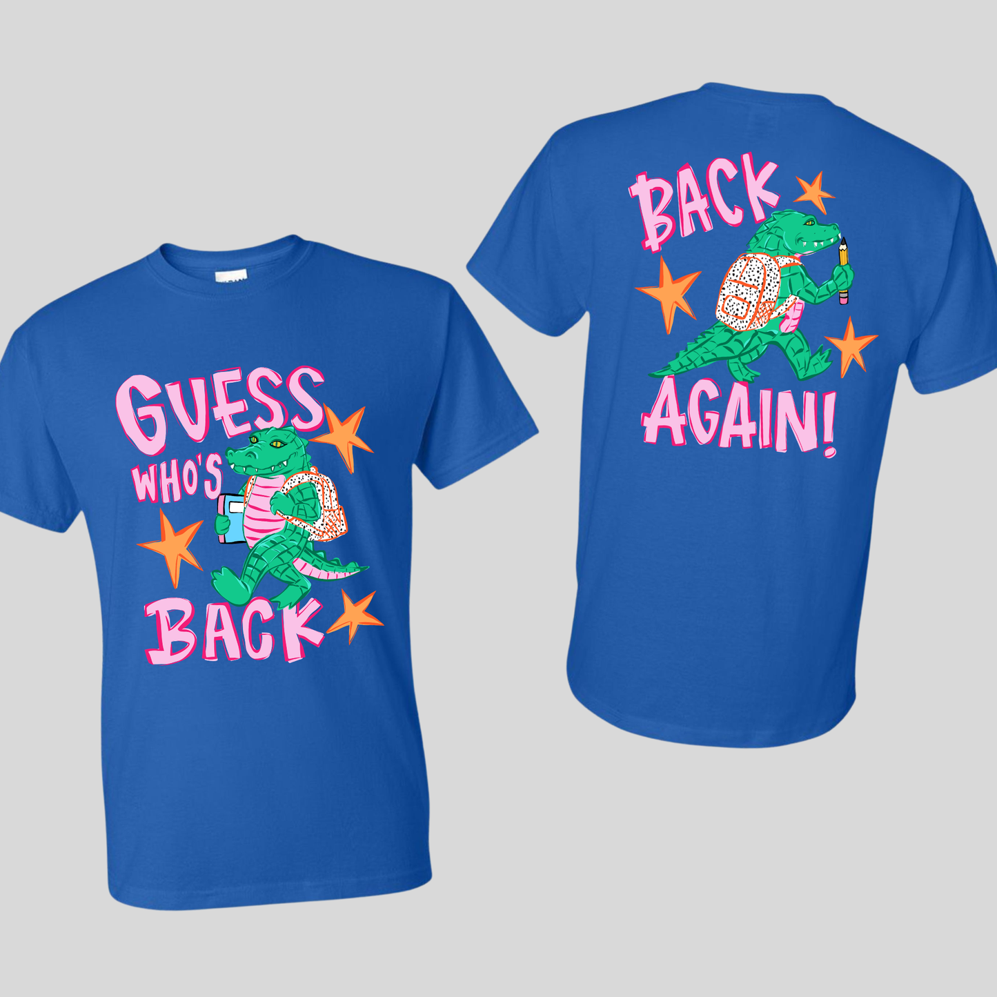 A royal blue short-sleeve t-shirt shown from both the front and back against a neutral gray background. The front features a graphic of a green alligator wearing a pink striped shirt, surrounded by pink text reading 'GUESS WHO'S BACK' and orange star accents.