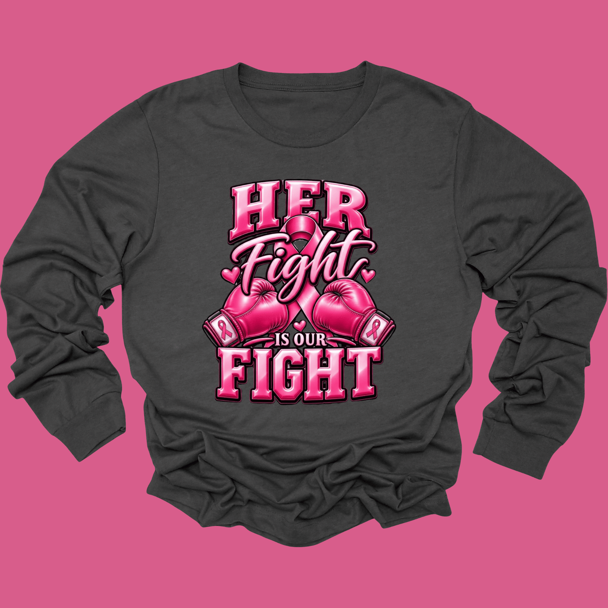 A dark charcoal gray long-sleeve t-shirt with a pink graphic print that reads 'HER Fight IS OUR FIGHT' with two pink boxing gloves, displayed on a solid pink background.