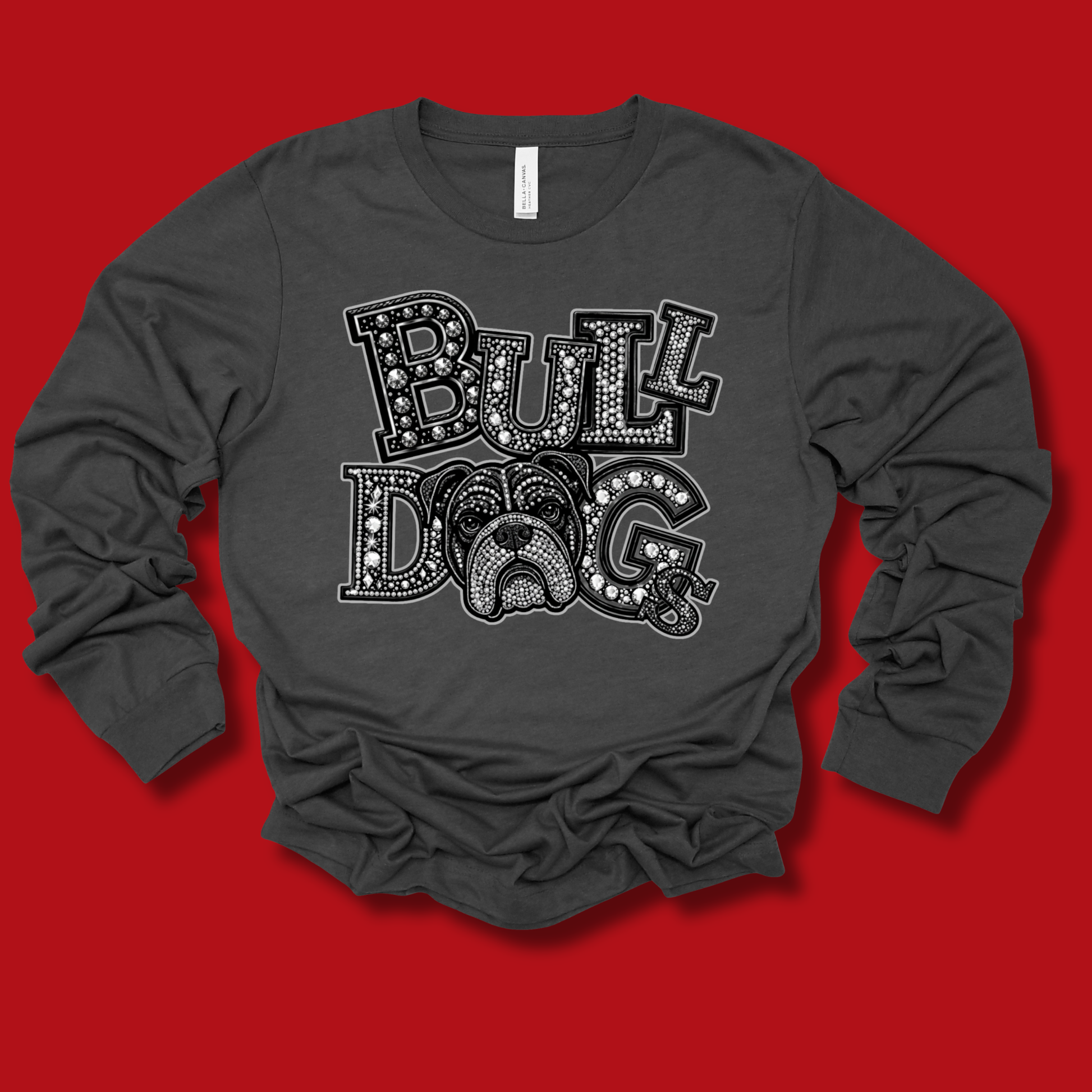 A dark gray long-sleeve t-shirt with a black and white 'BULL DOG' graphic featuring a bulldog face, laid flat on a solid red background.
