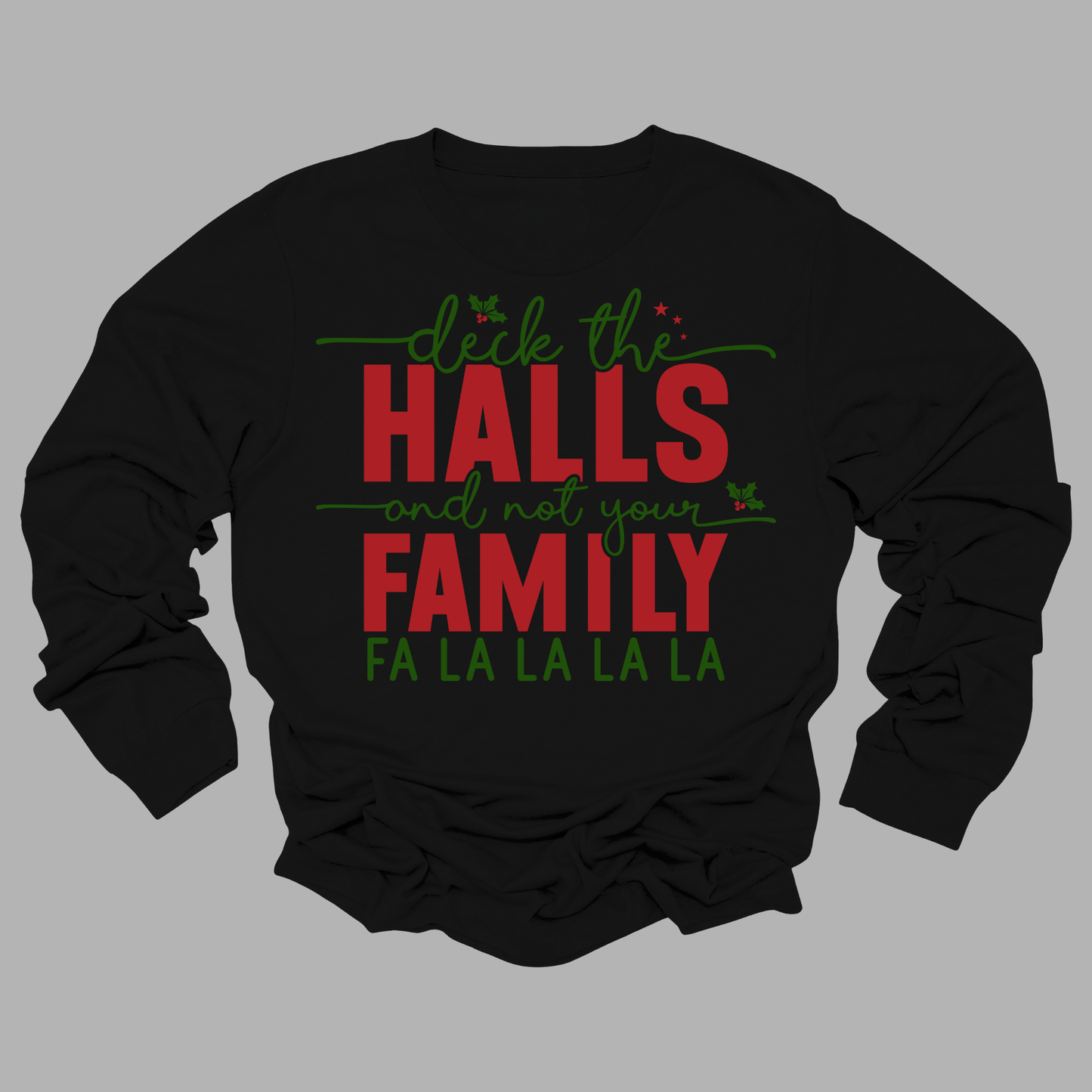 Black long-sleeve shirt with Christmas-themed text on a gray background