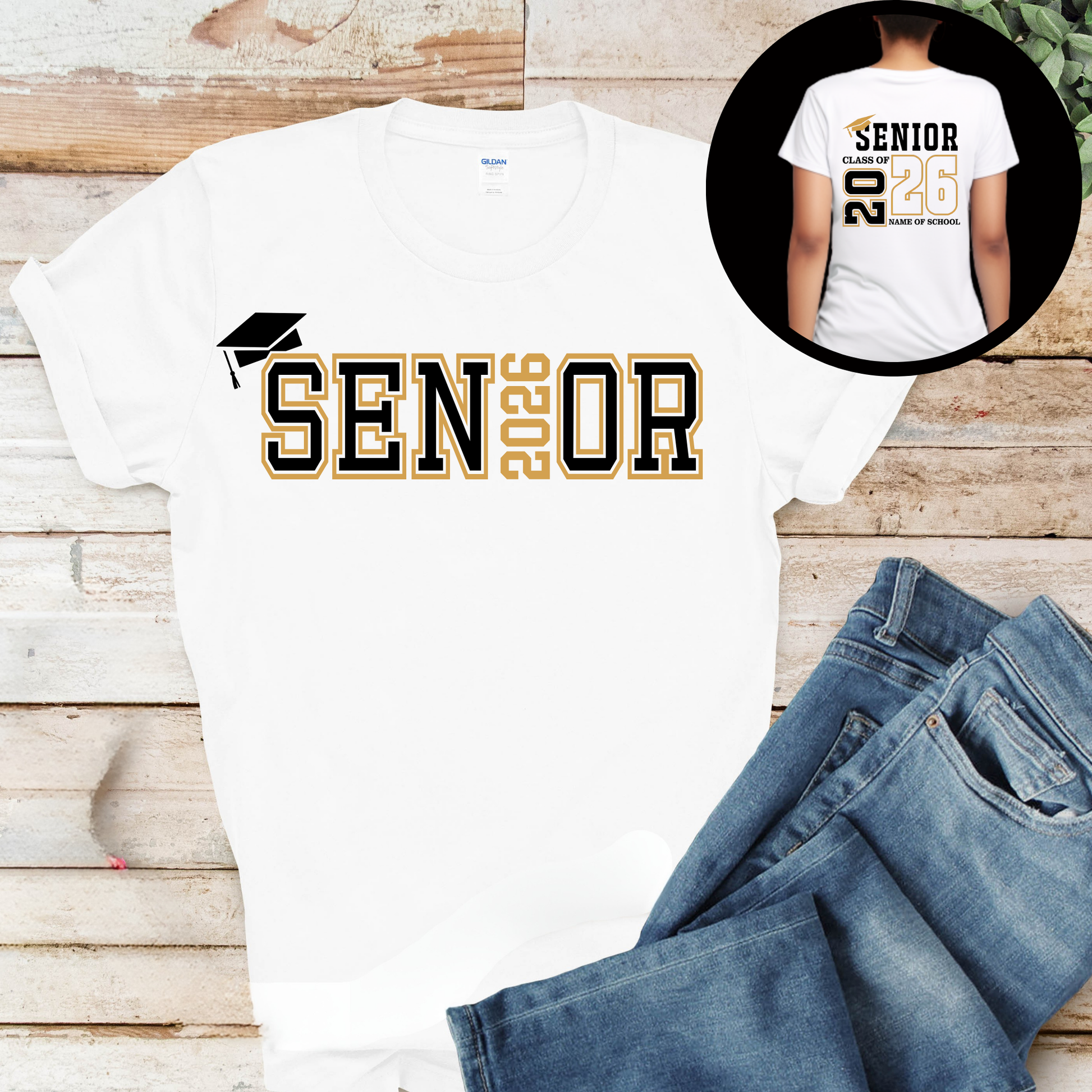 White t-shirt with 'Senior 2026' text on a wooden surface with jeans.