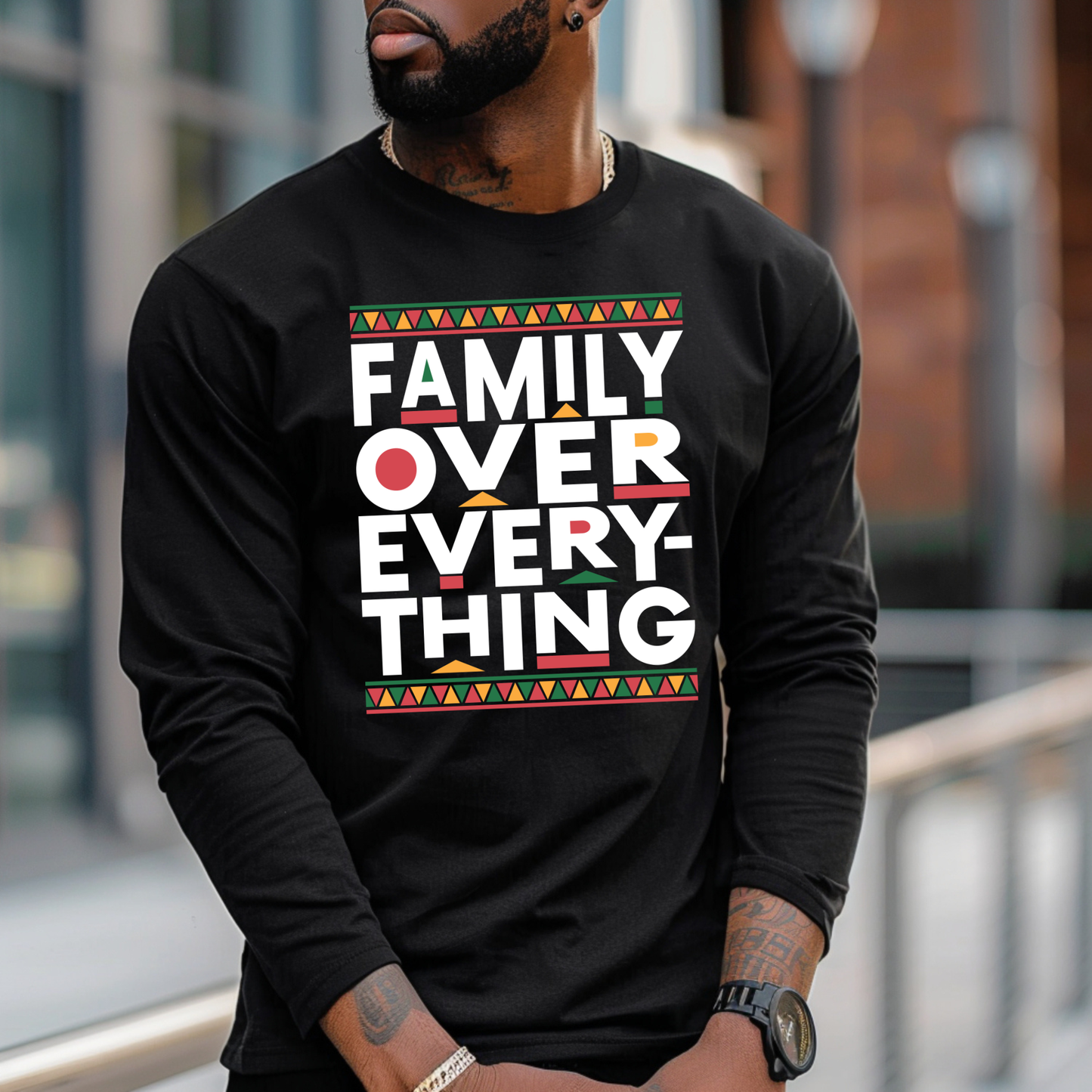Person wearing a black long-sleeve shirt with 'Family Over Everything' text.
