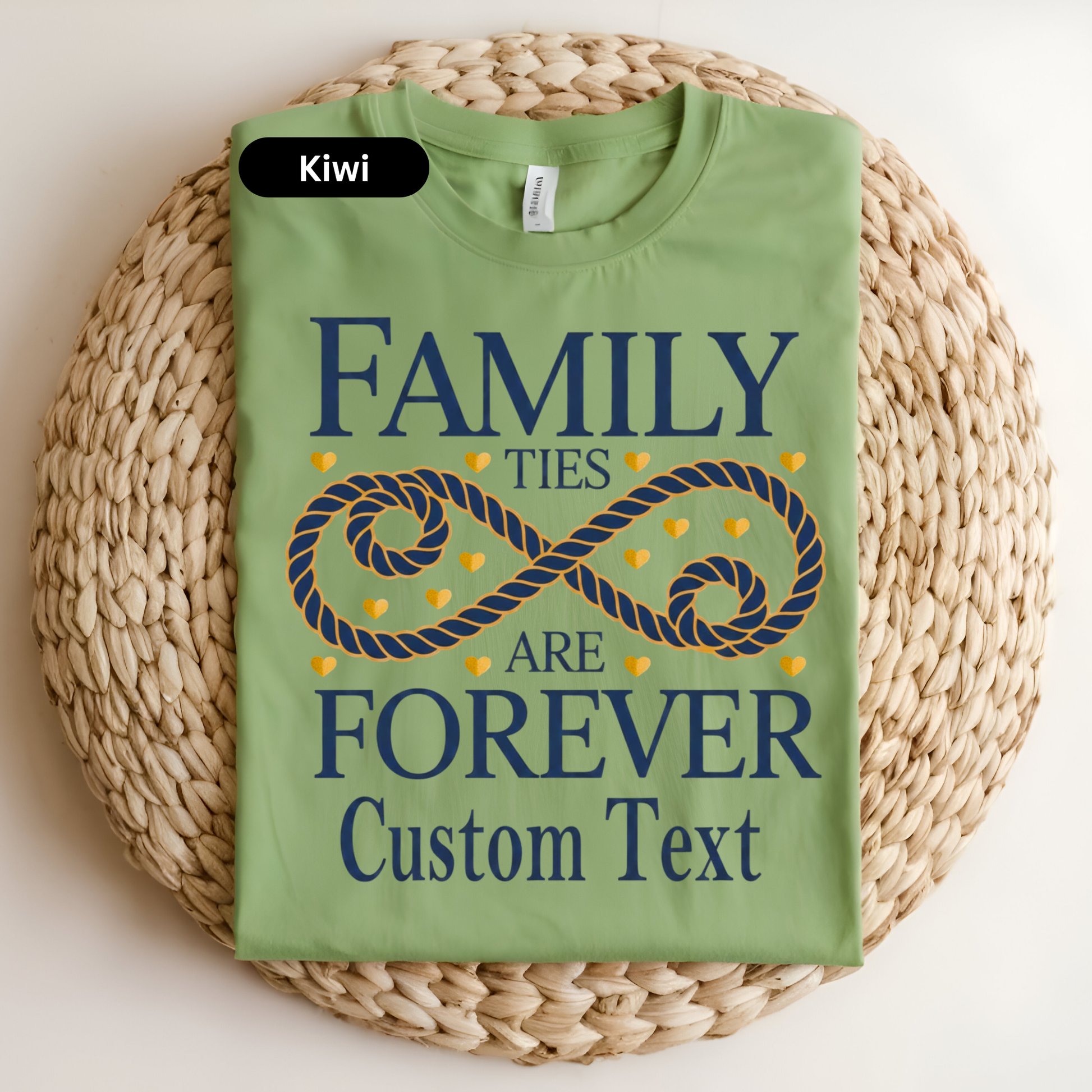 Green t-shirt with 'Family ties are forever Custom Text' design on a woven surface