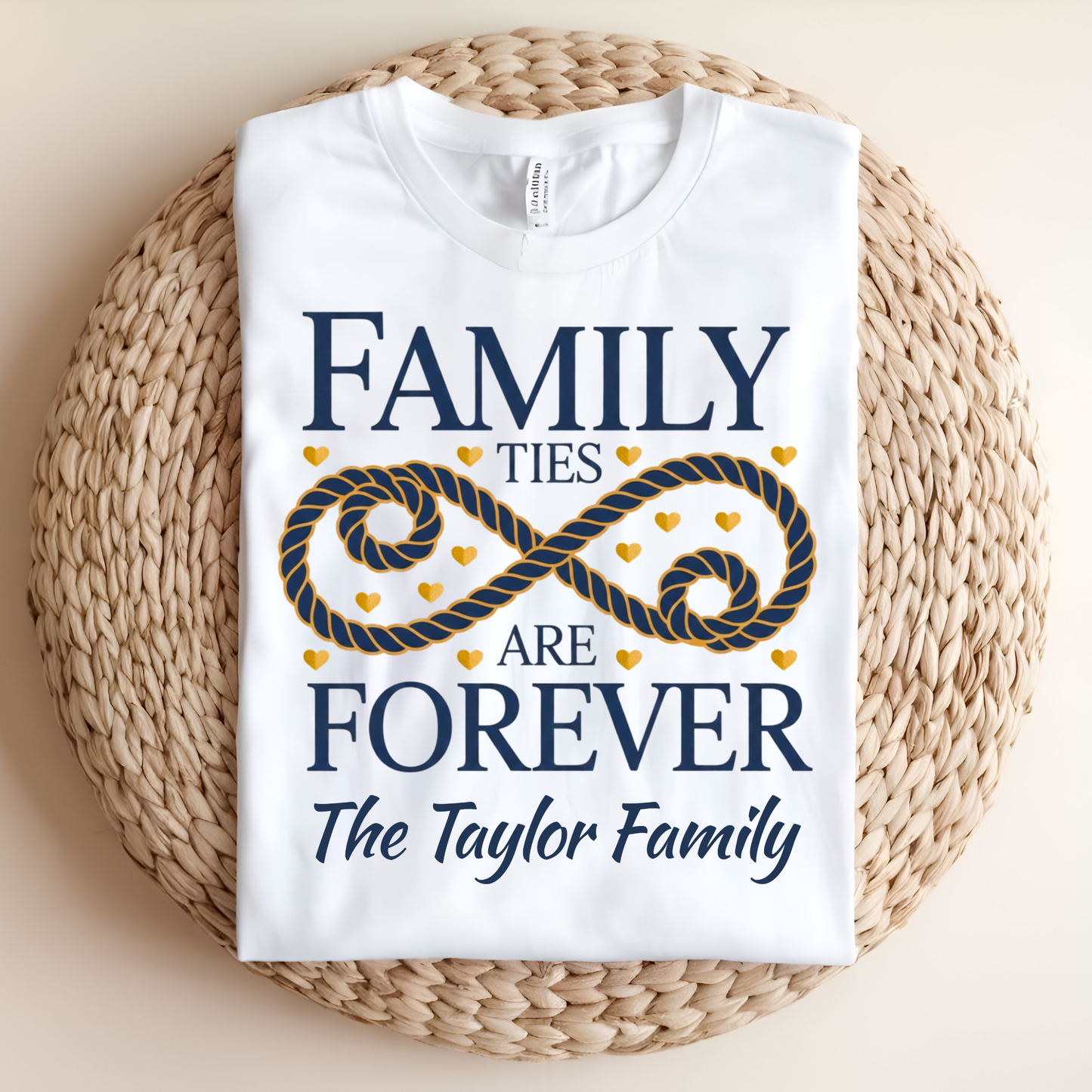 White t-shirt with 'Family ties are forever The Taylor Family' design on a woven mat.