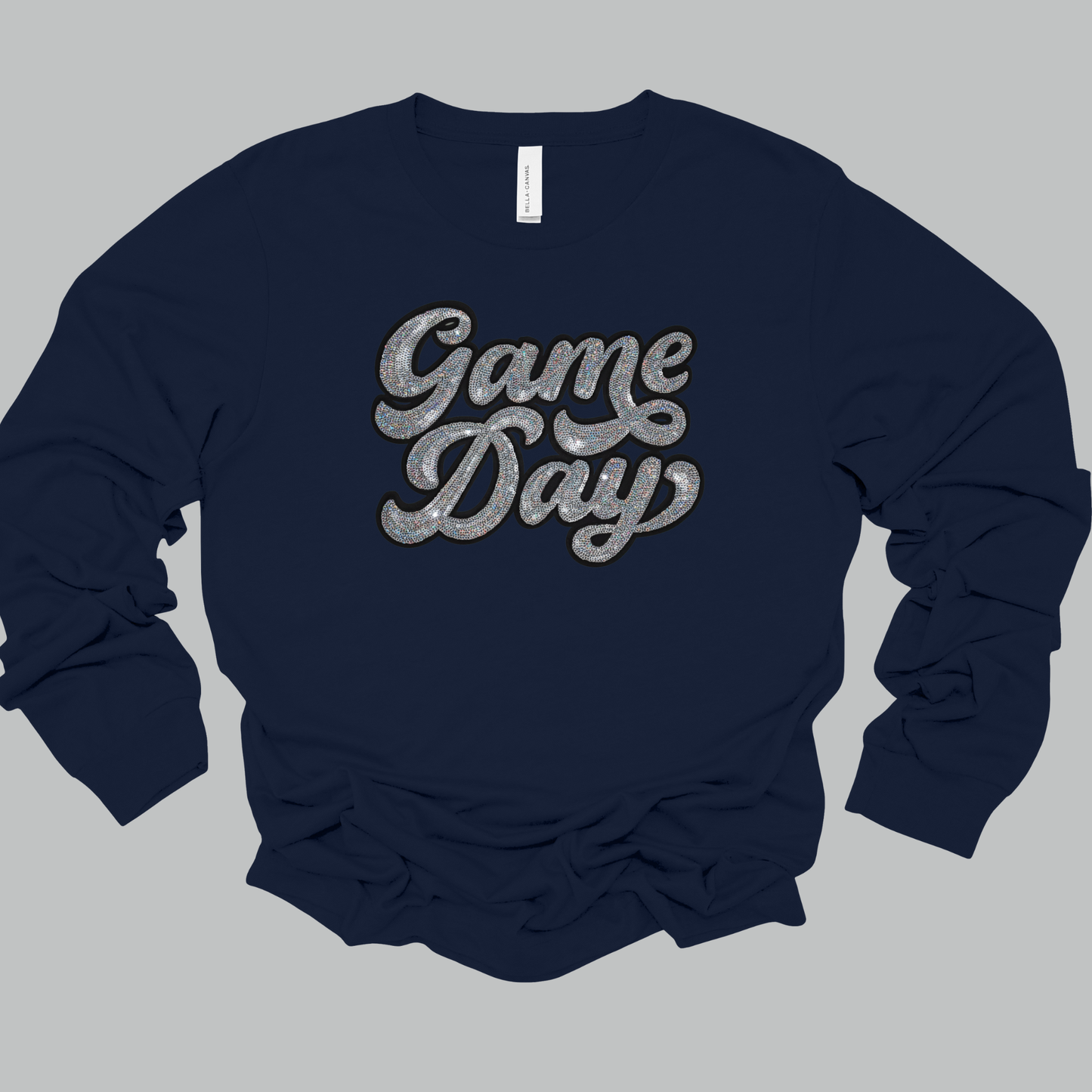 Navy blue sweatshirt with 'Game Day' text on a gray background