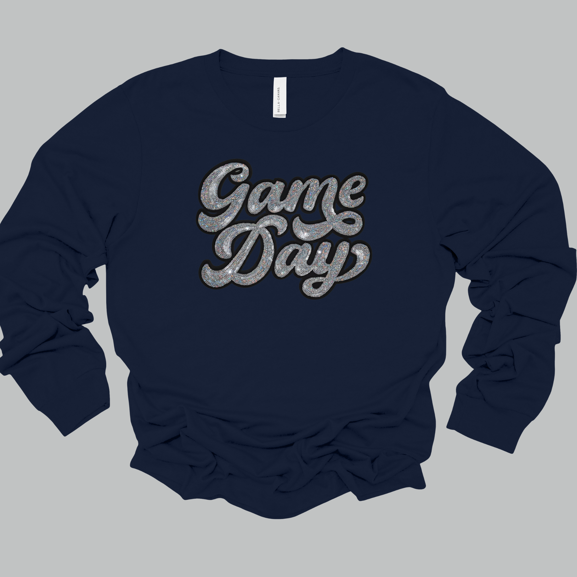 Navy blue sweatshirt with 'Game Day' text on a gray background
