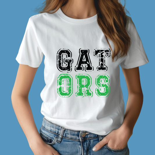 Person wearing a white t-shirt with 'GAT ORS' text on a blue background Gators Mascot Shirt - Gators Game Day Cool School Spirit Tee