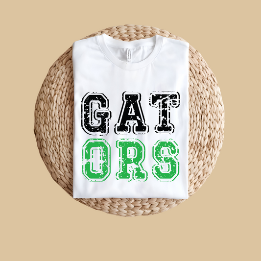 White sweatshirt with 'GAT ORS' text on a woven mat  Gators Mascot Shirt - Gators Game Day Cool School Spirit Tee